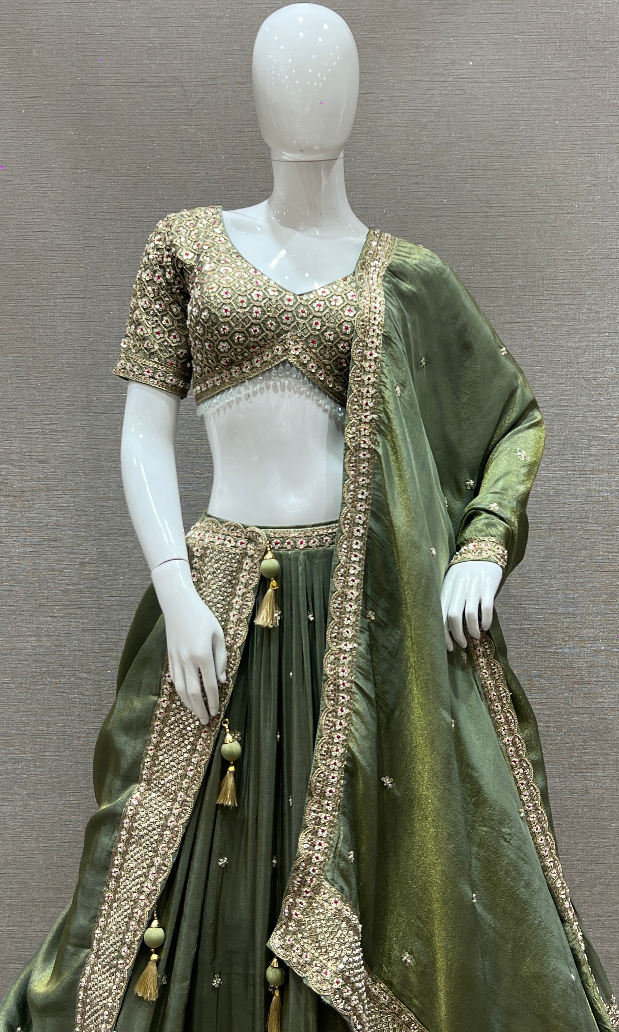 Vanika Sitara - Sage Green Lehenga with Floral & Gold Thread Work Embellishments