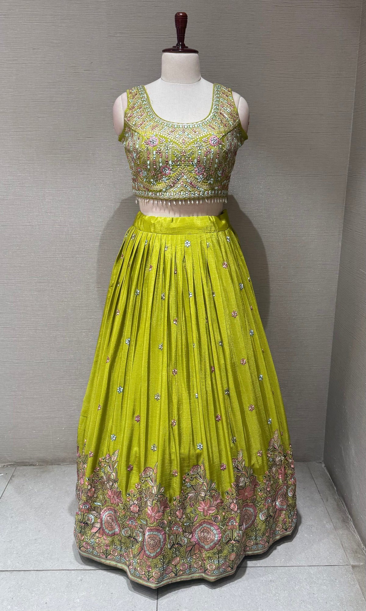 Green Tissue silk lehenga set with intricate floral embroidery