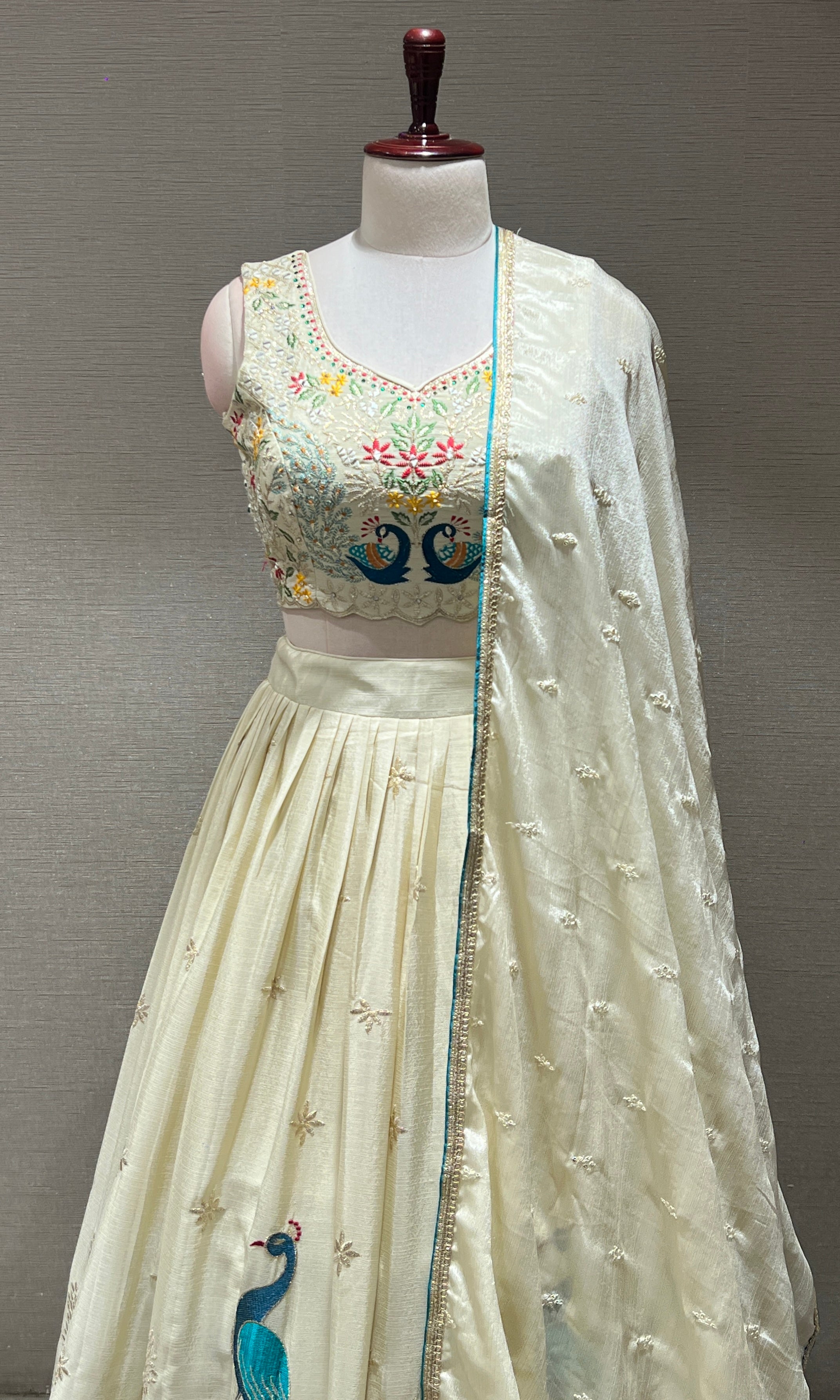 Cream Lehenga WITH PEACOCK DESIGN