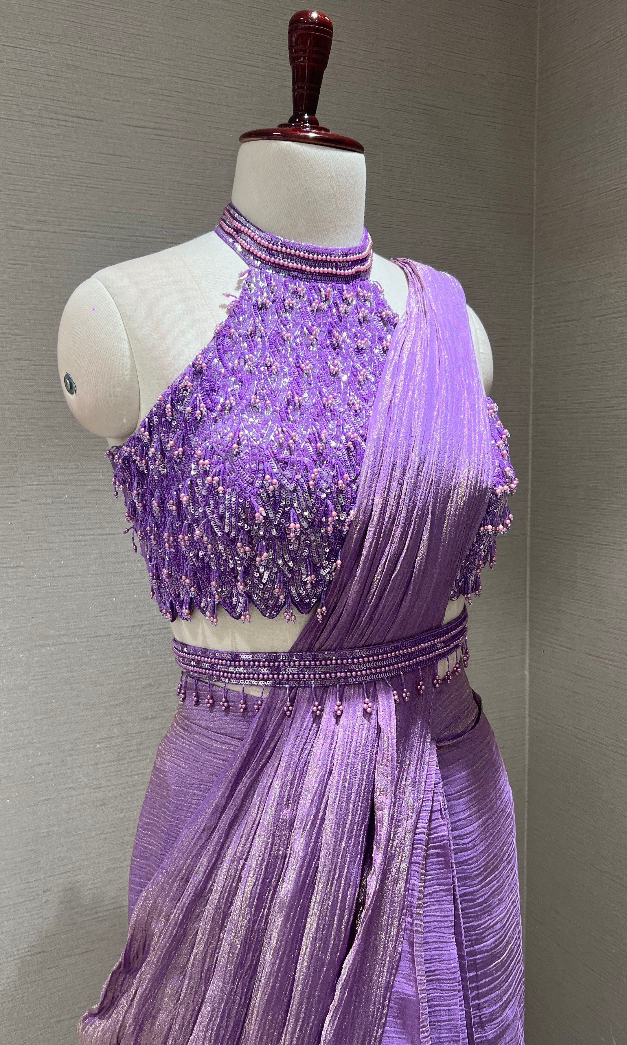 Purple drape saree with halter neck blouse