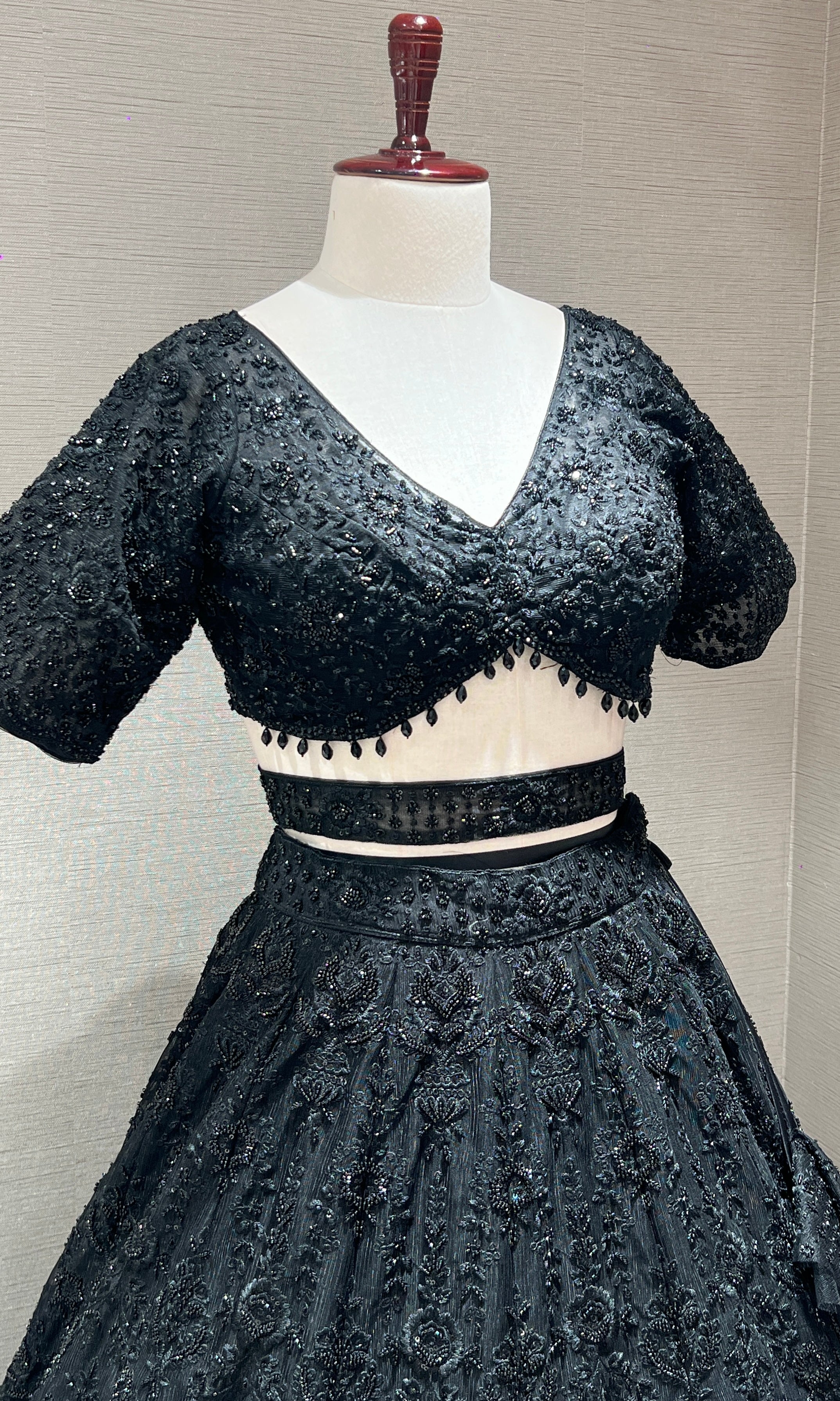 Black lehenga with pretty blouse and netted dupatta