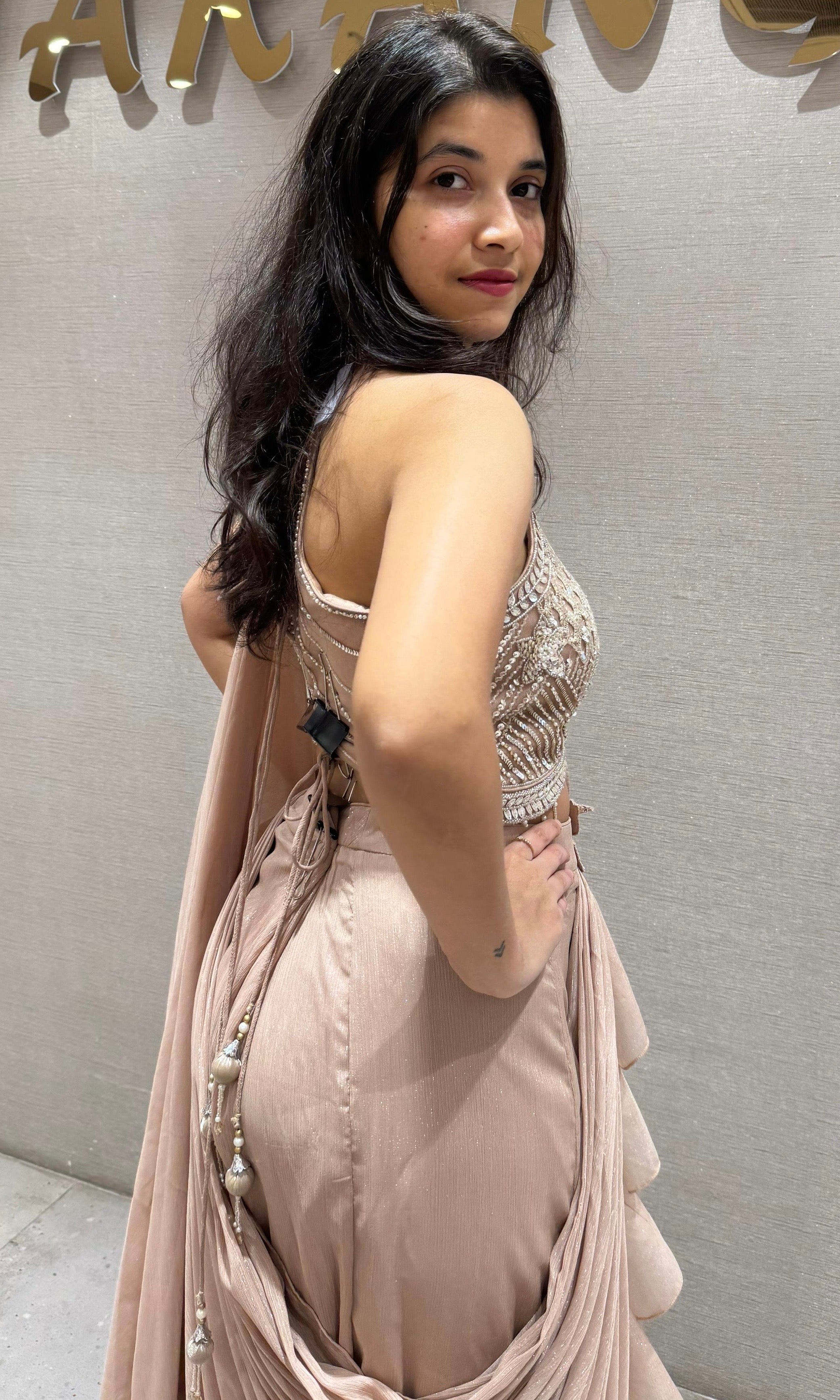 Beige Ruffle drape saree with Embellished blouse