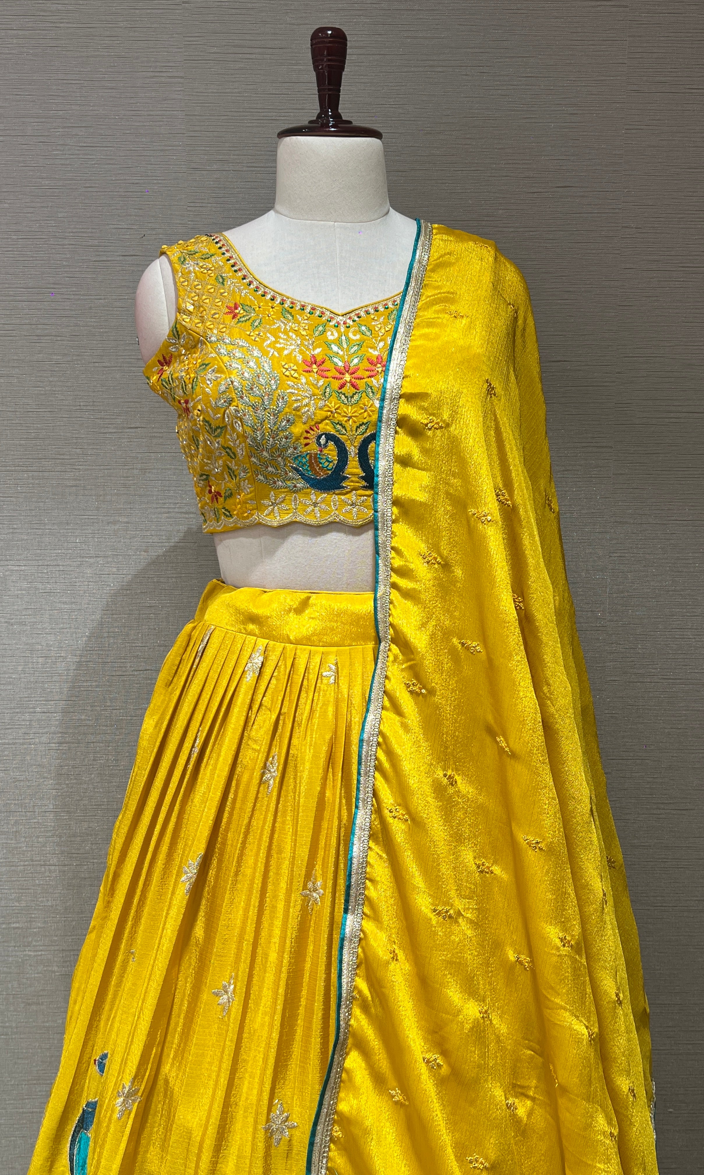 yellow lehenga with peacock design