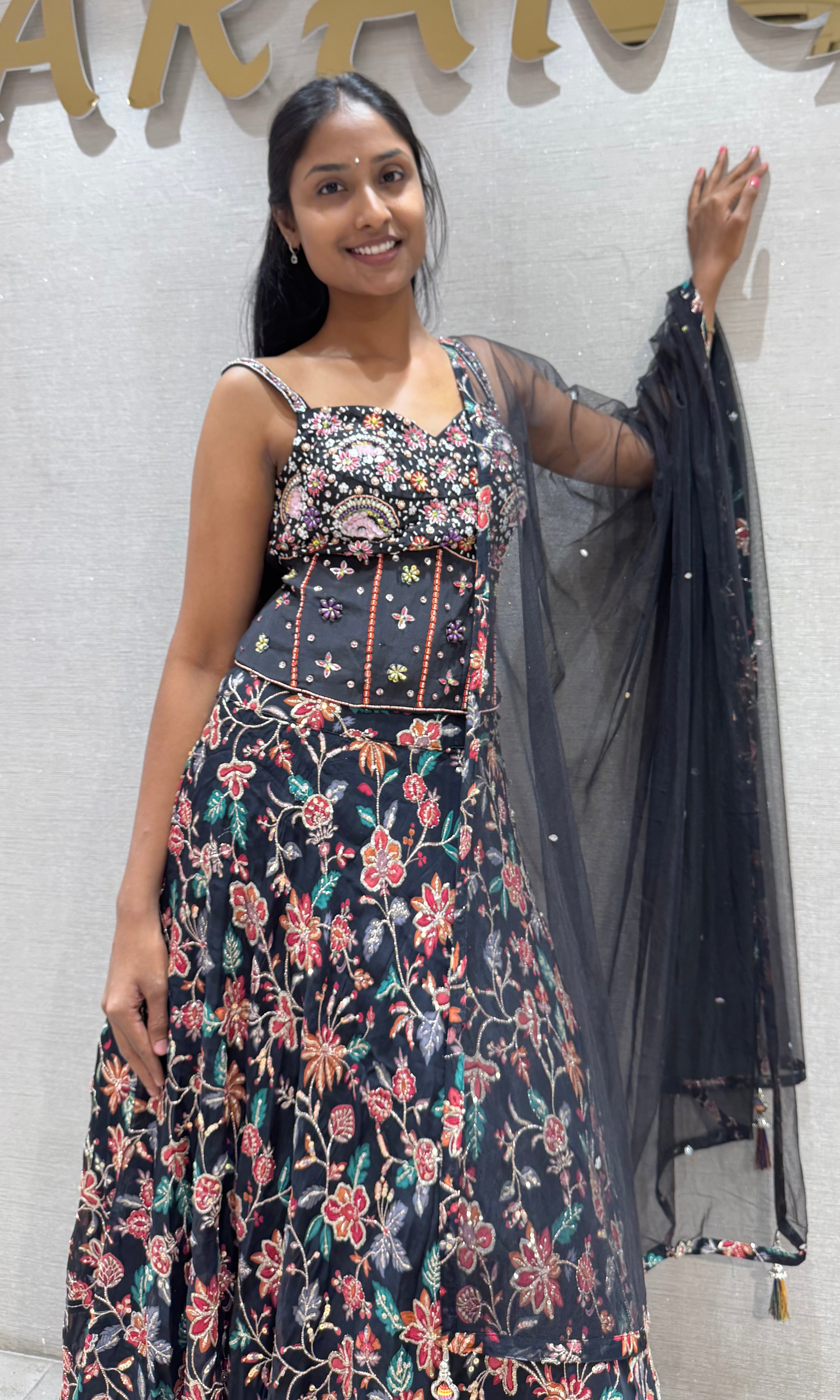 black floral printed lehenga set with corset blouse