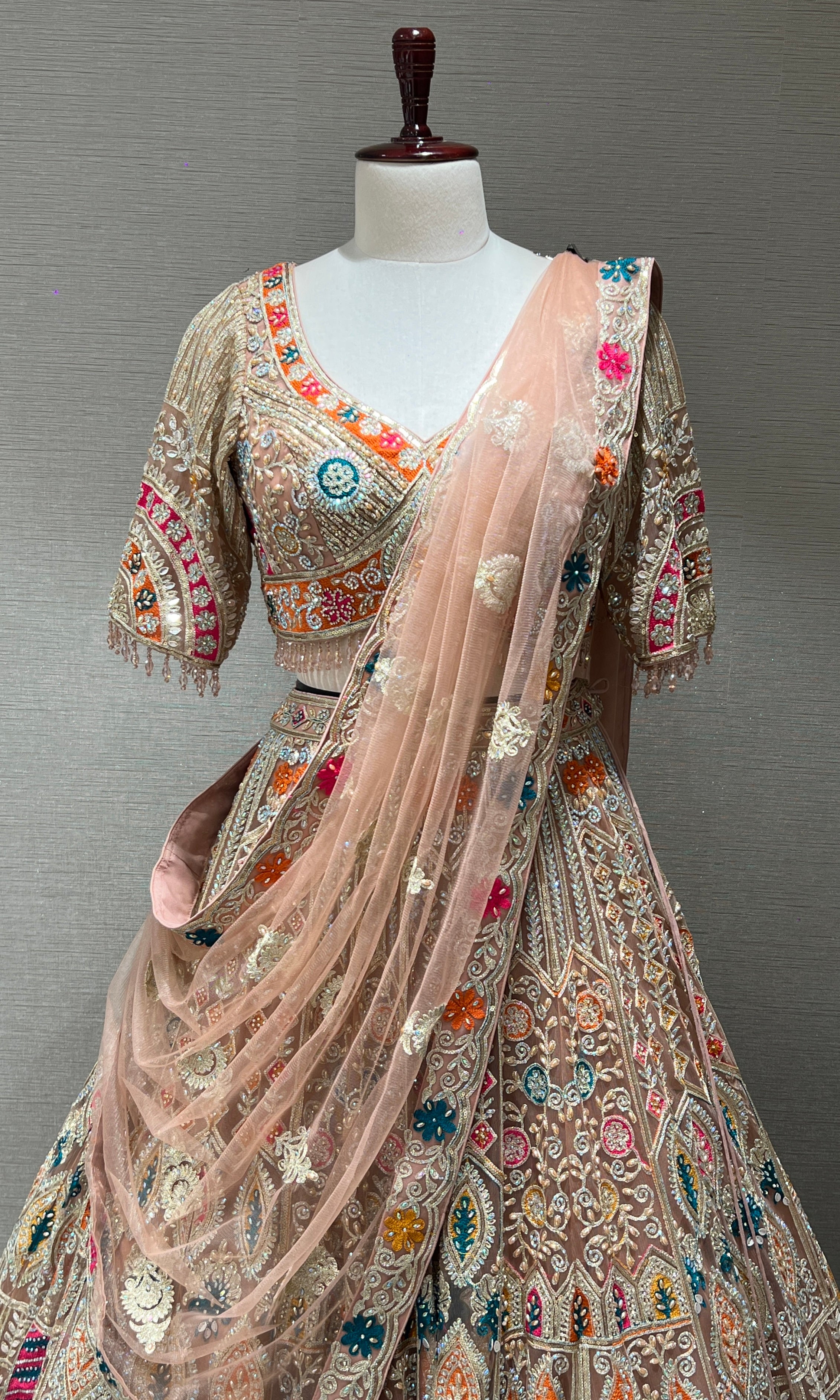 Peach Lehenga with Sequin and stone embellishments