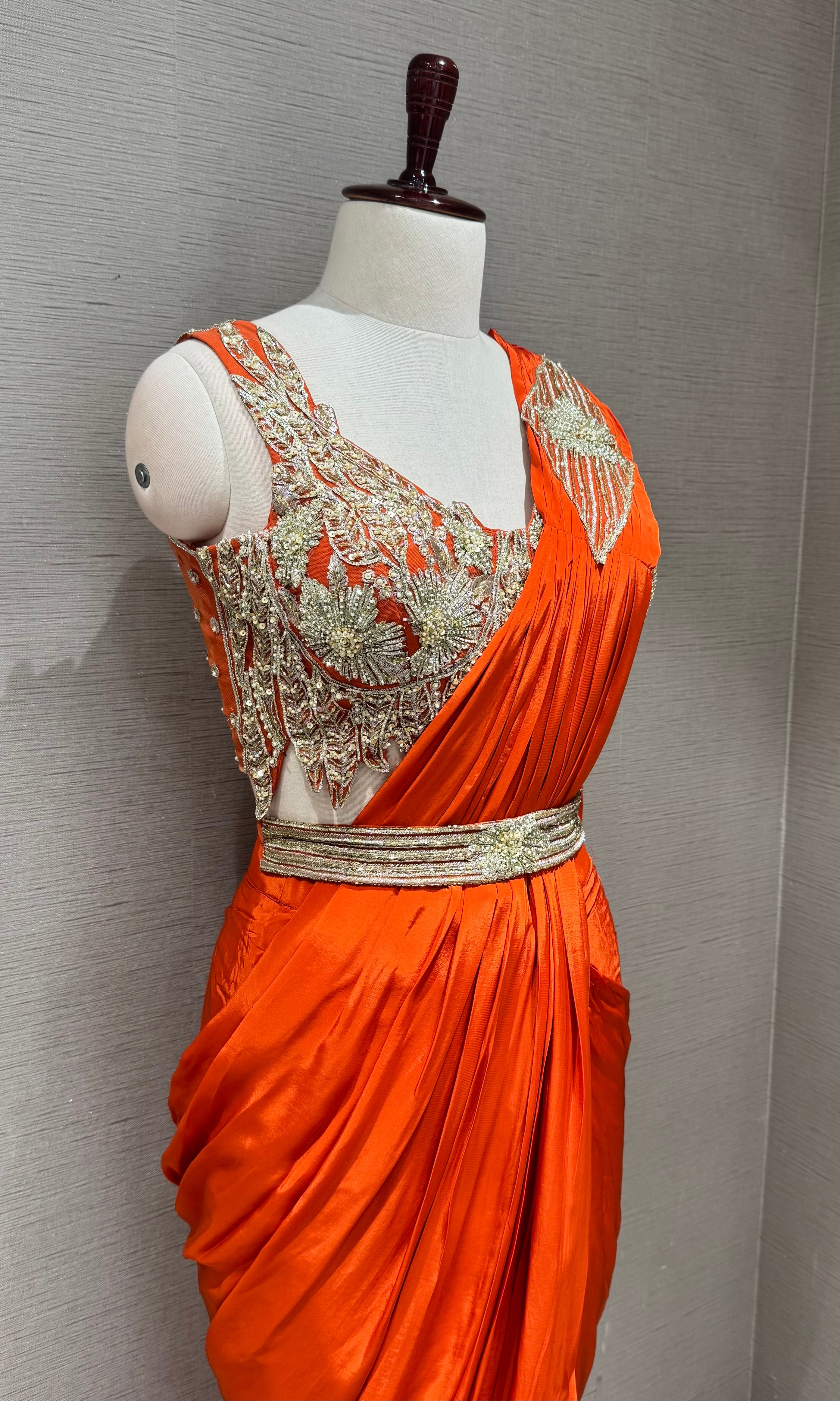 Orange Draped Saree with embroidered blouse & belt