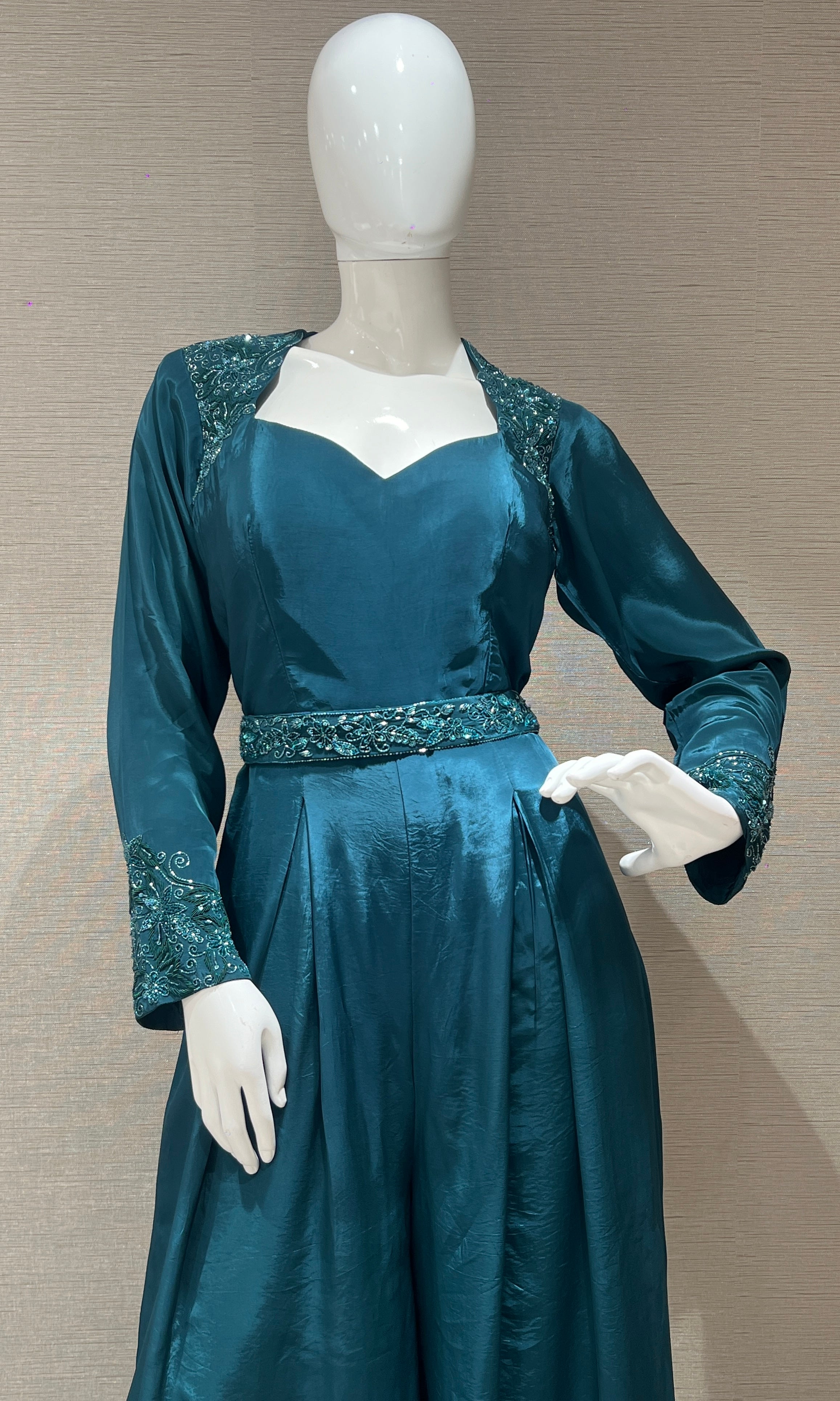 Green jumpsuit with belt