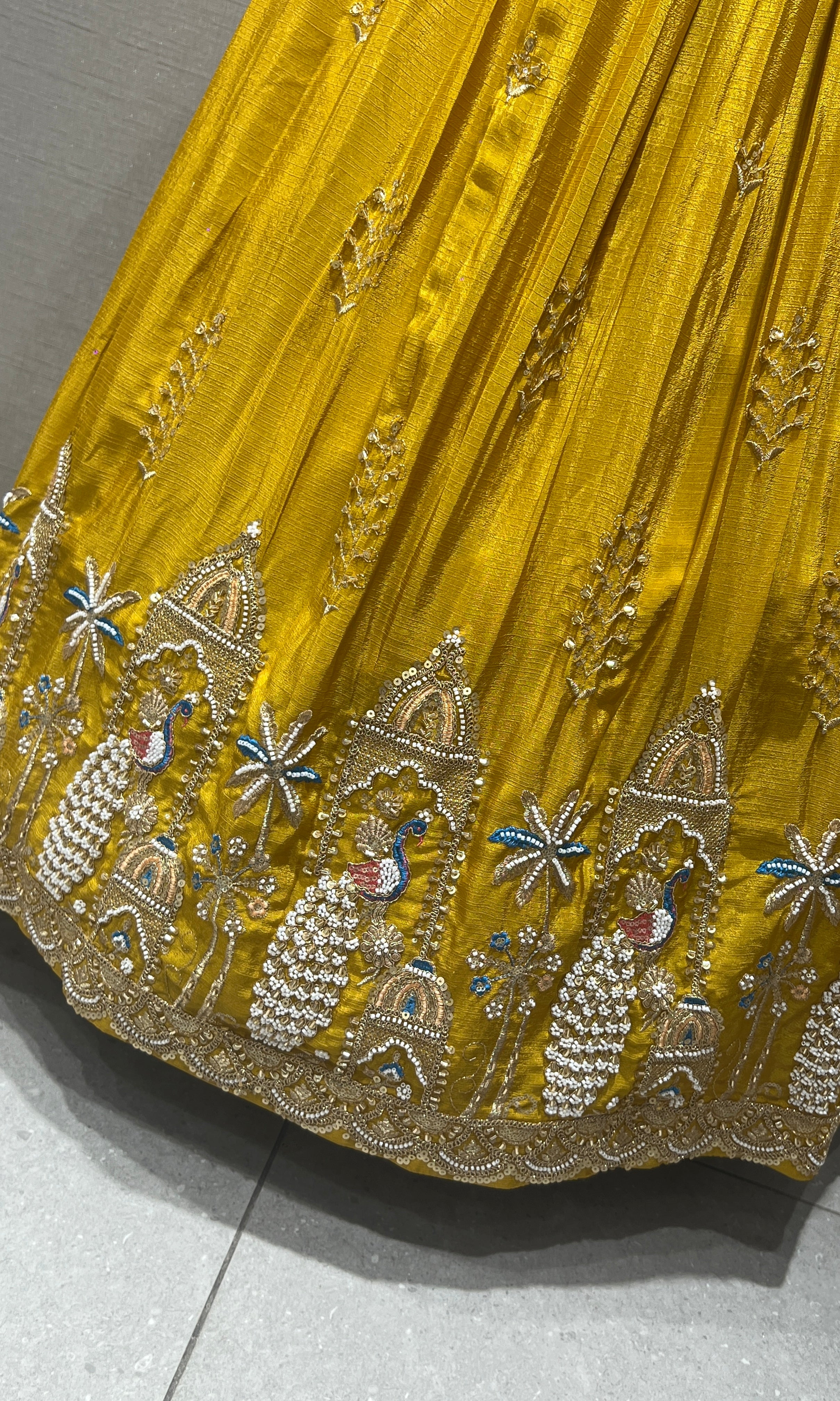 Yellow peacock embroidered Lehenga