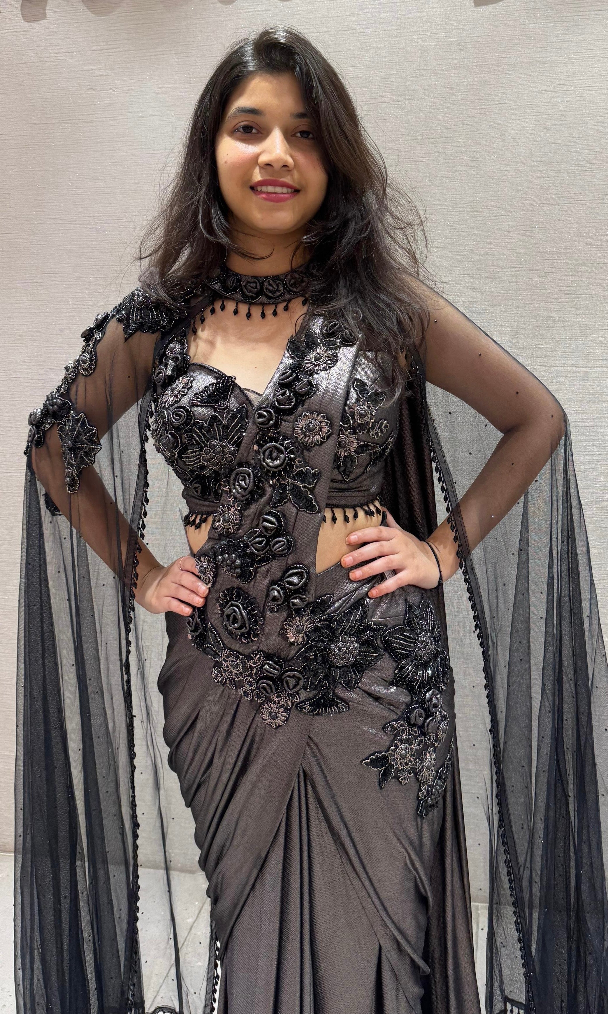 Black sequin drape saree with sheer cape