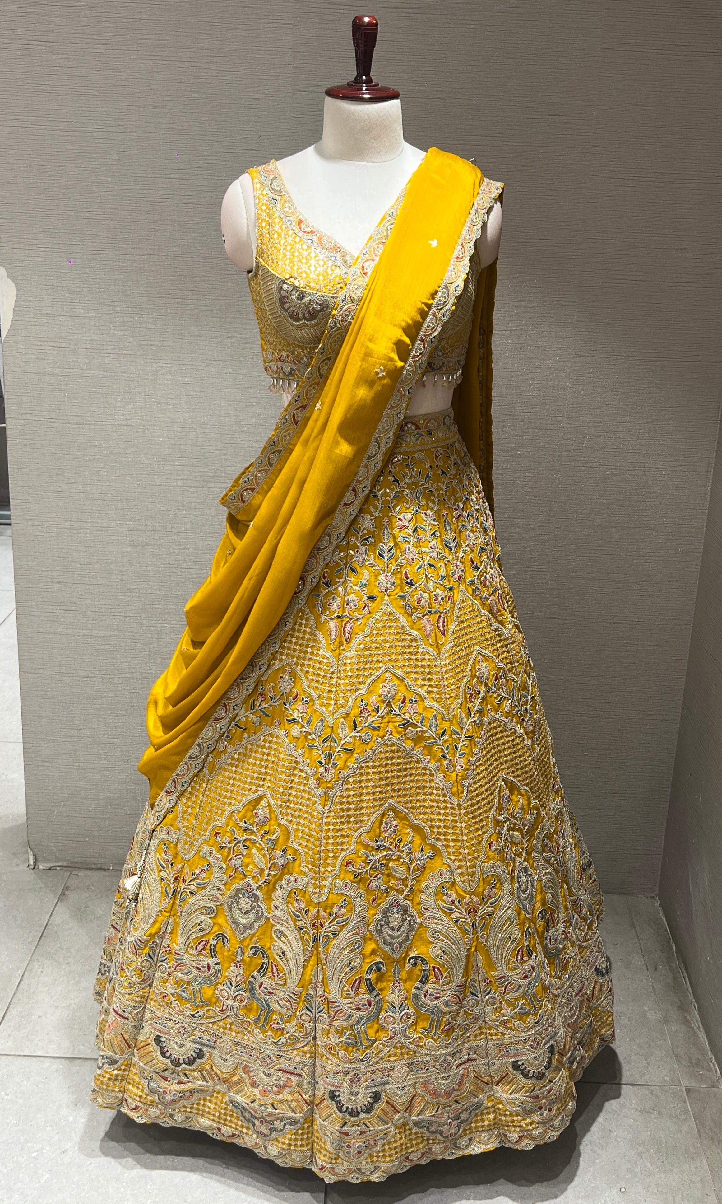 sunshile yellow lehenga with intircate embroidery