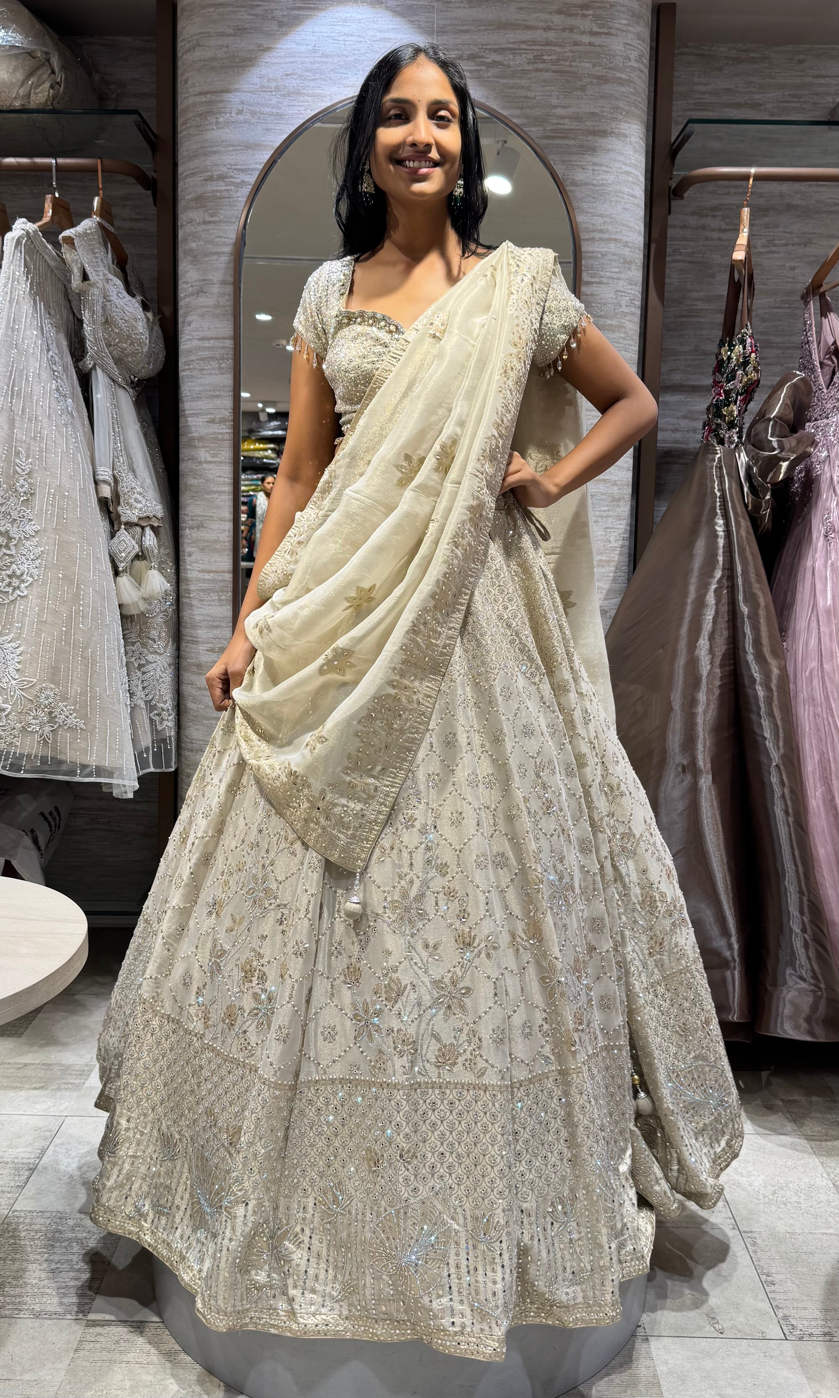 Gold intricate silver embroidery lehenga