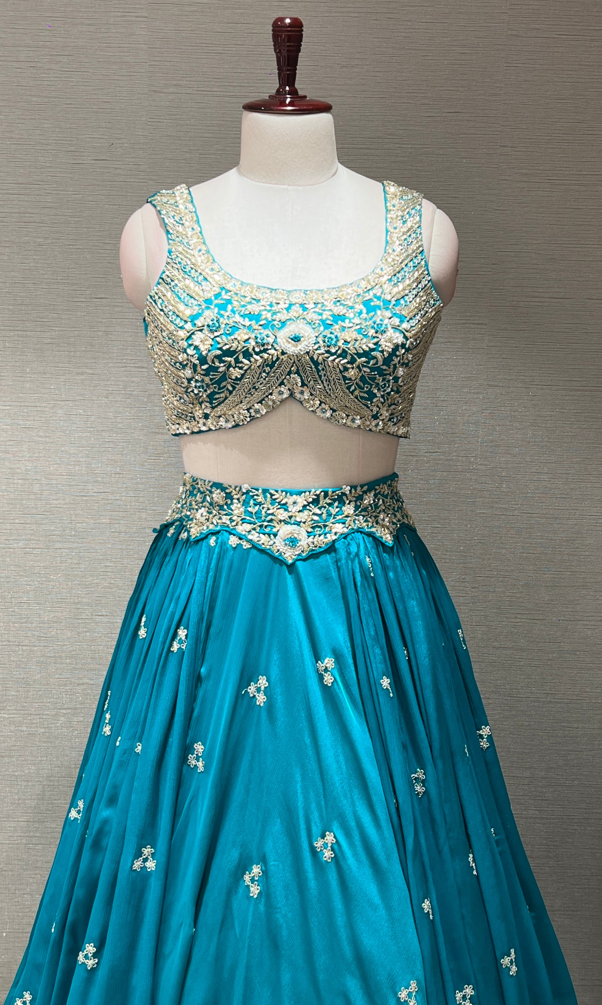 Teal blue gold zari embroidered lehenga