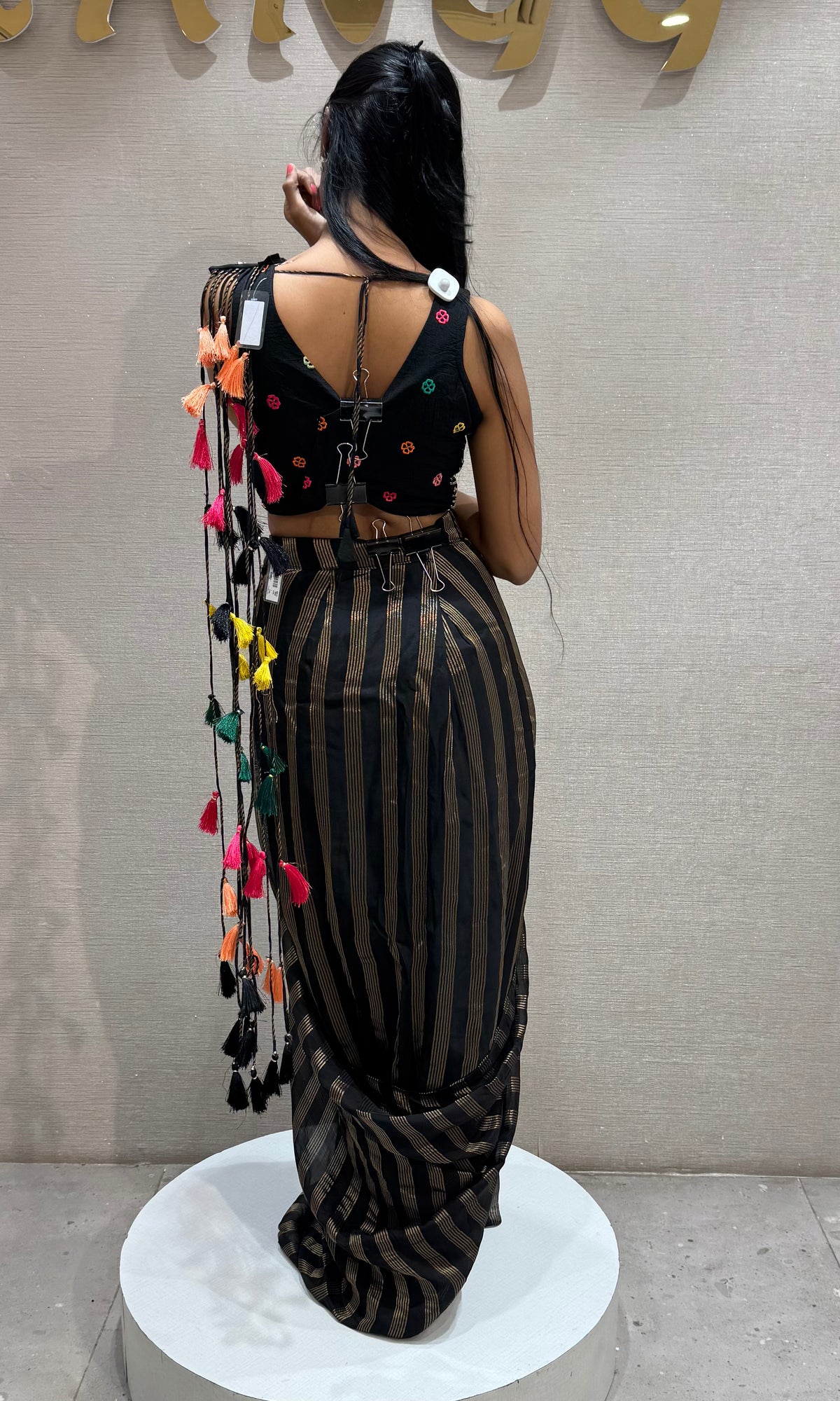 Black and silver striped drape saree with intricate blouse