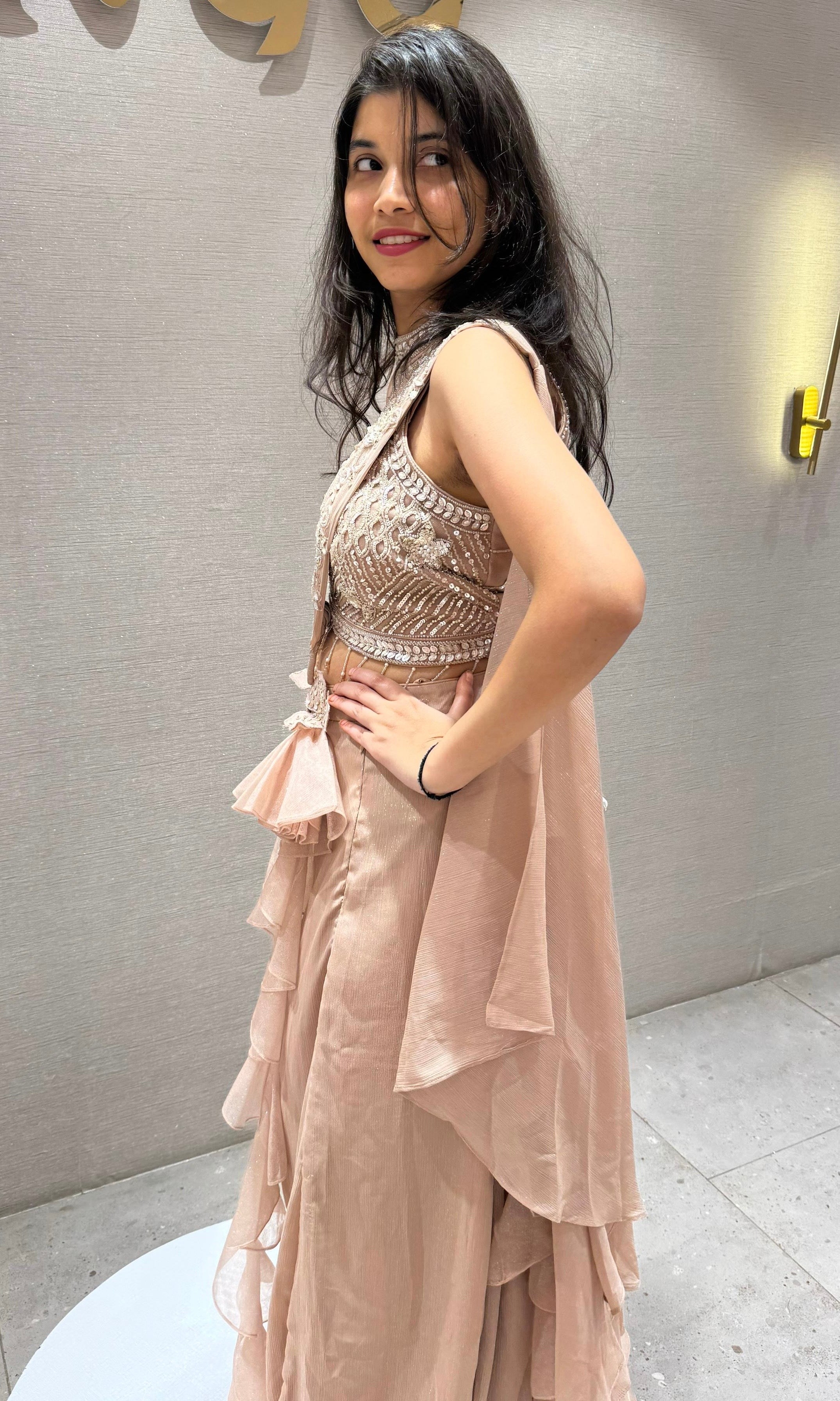 Beige Ruffle drape saree with Embellished blouse