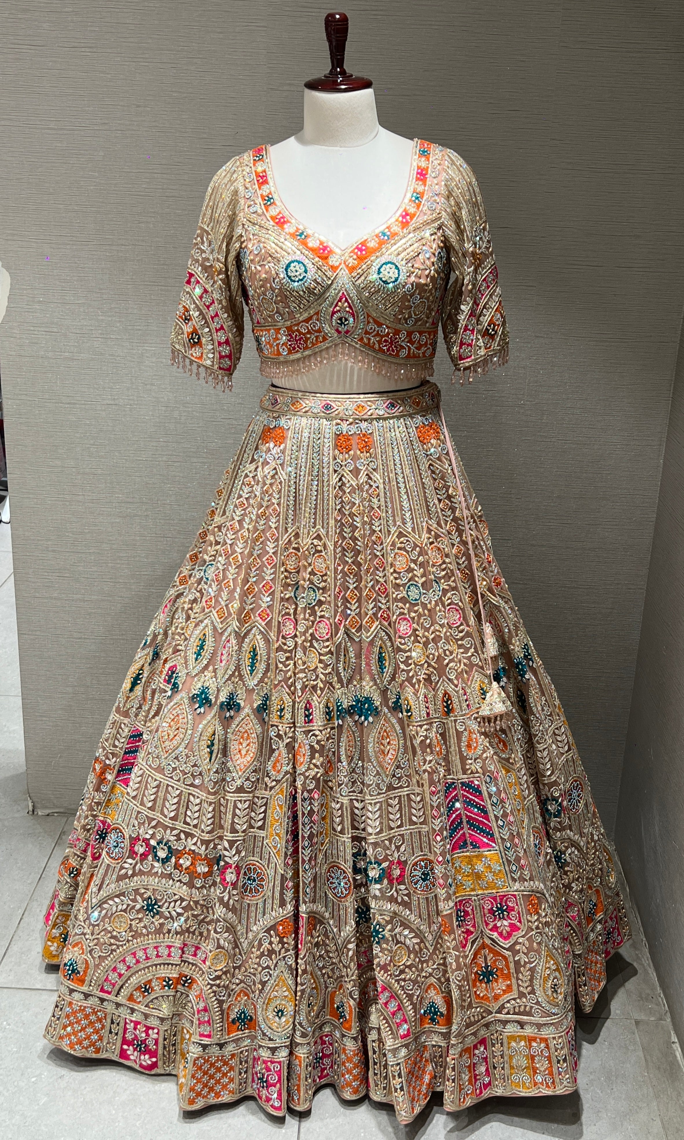 Peach Lehenga with Sequin and stone embellishments