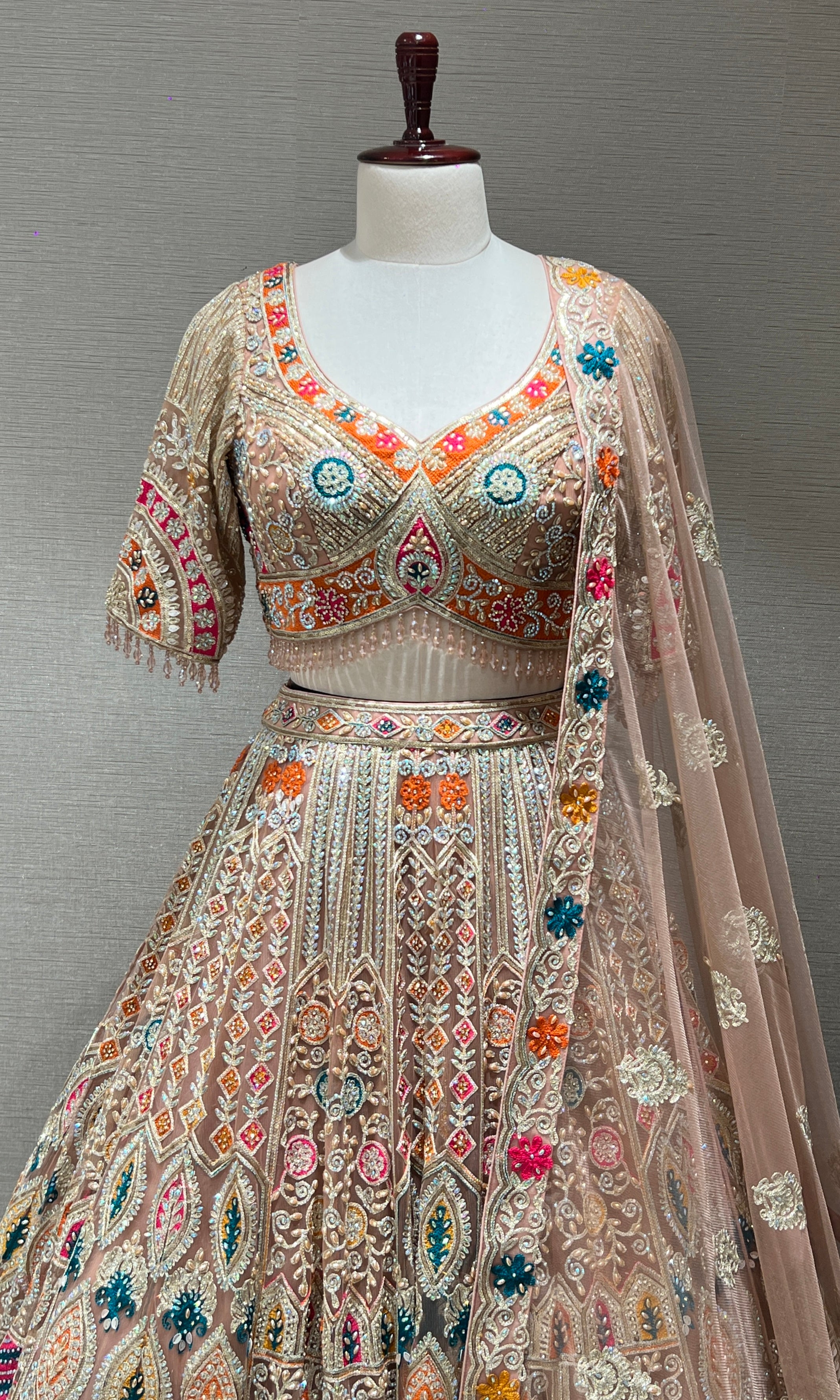 Peach Lehenga with Sequin and stone embellishments