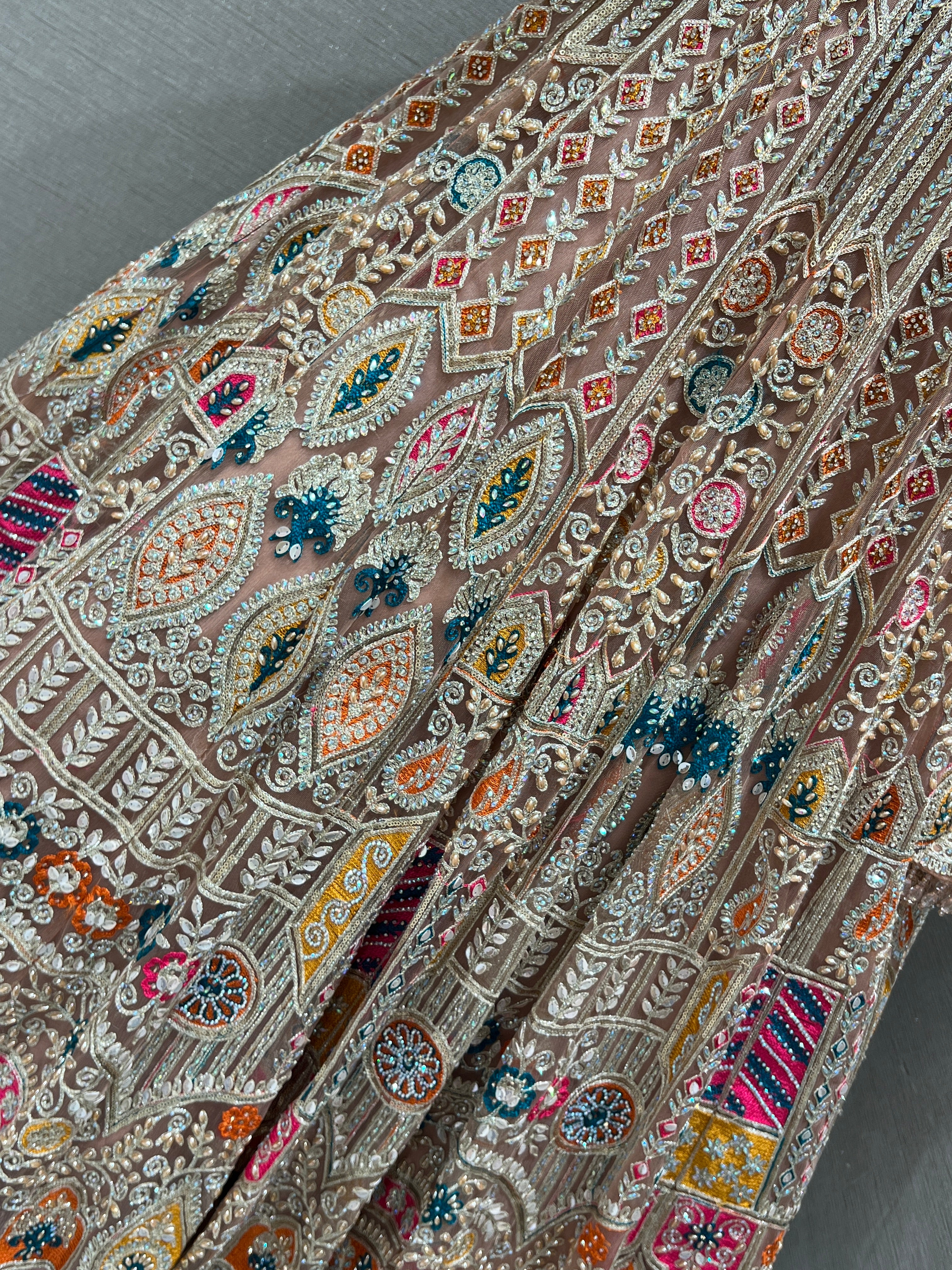 Peach Lehenga with Sequin and stone embellishments