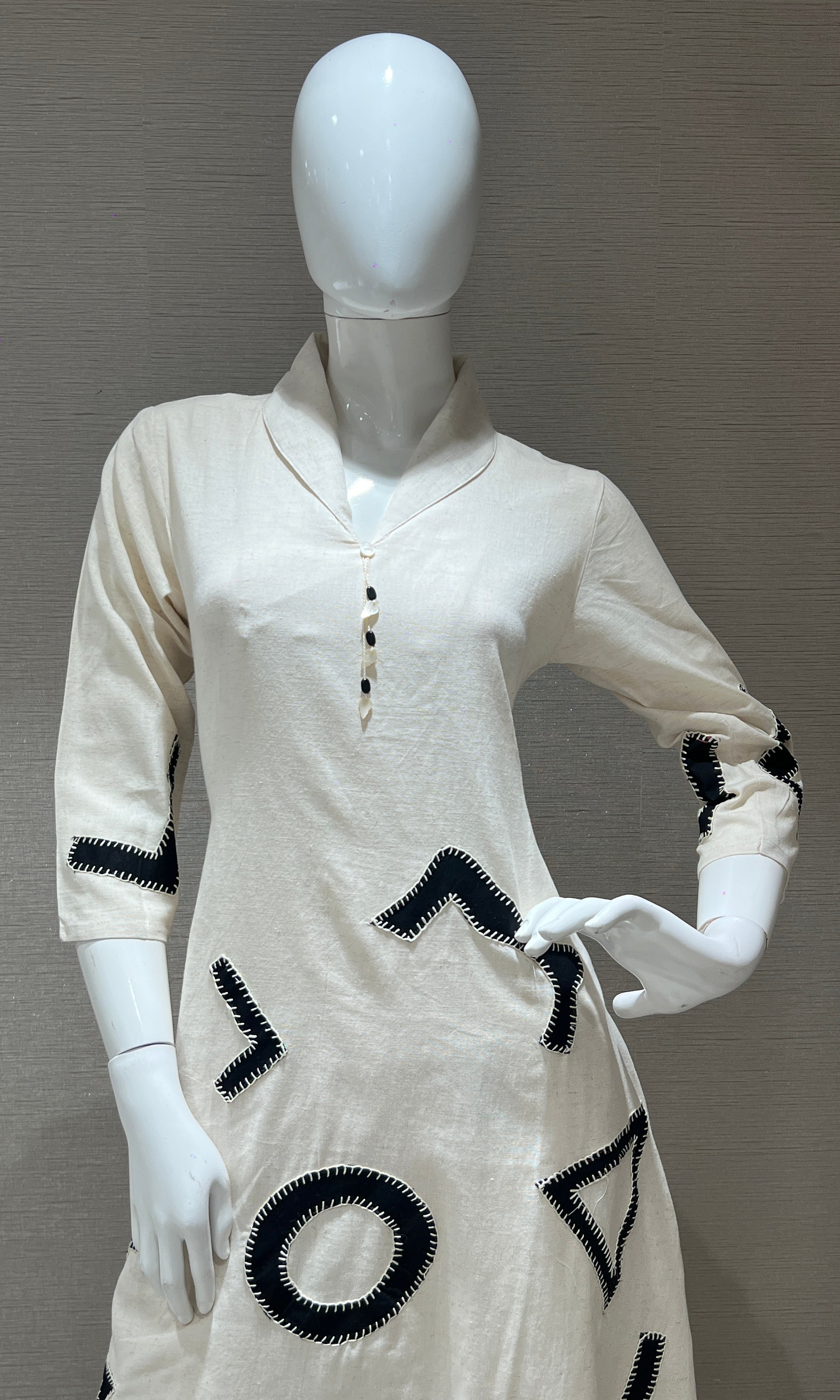 Cream kurta set with a black abstract print