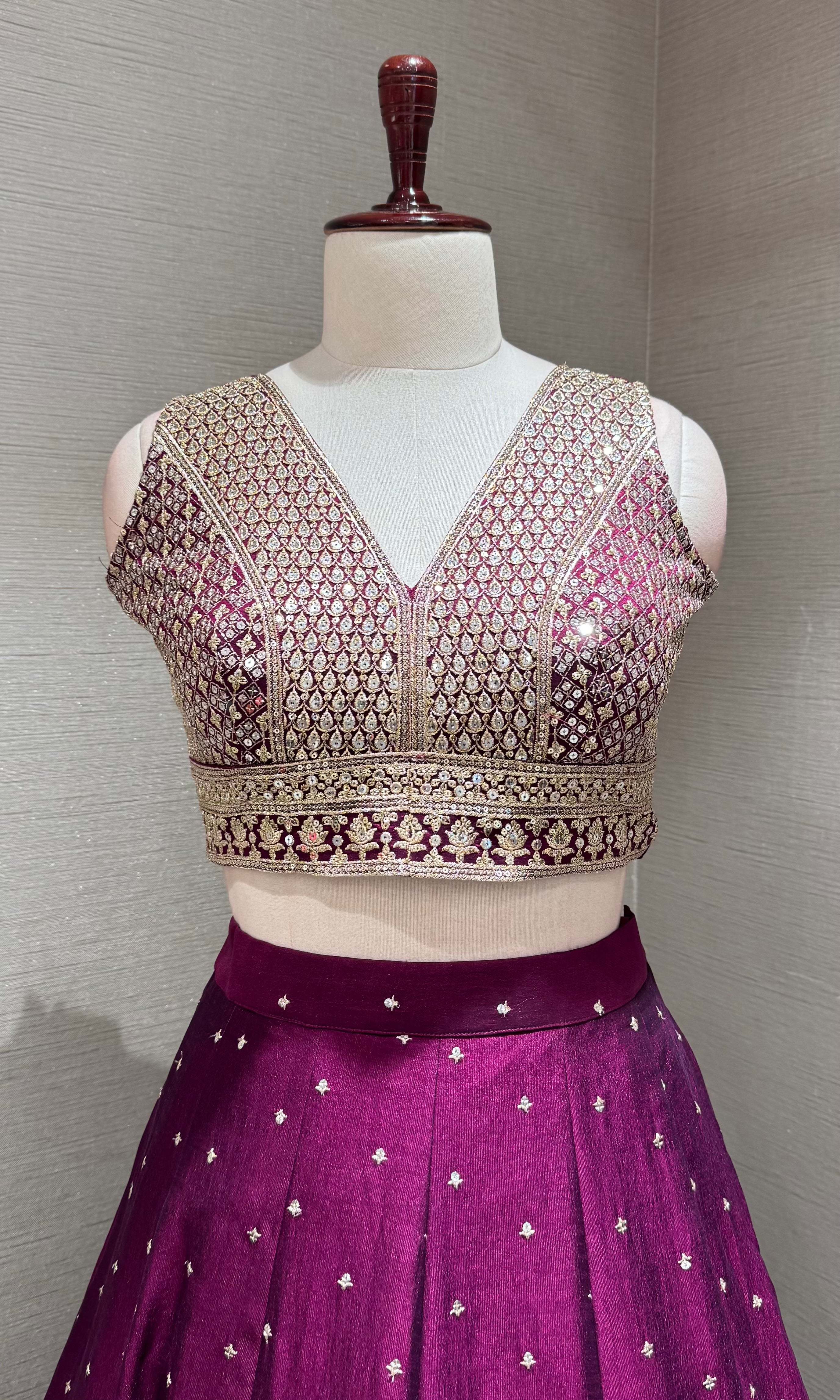 Wine and gold embroidered Lehenga Choli