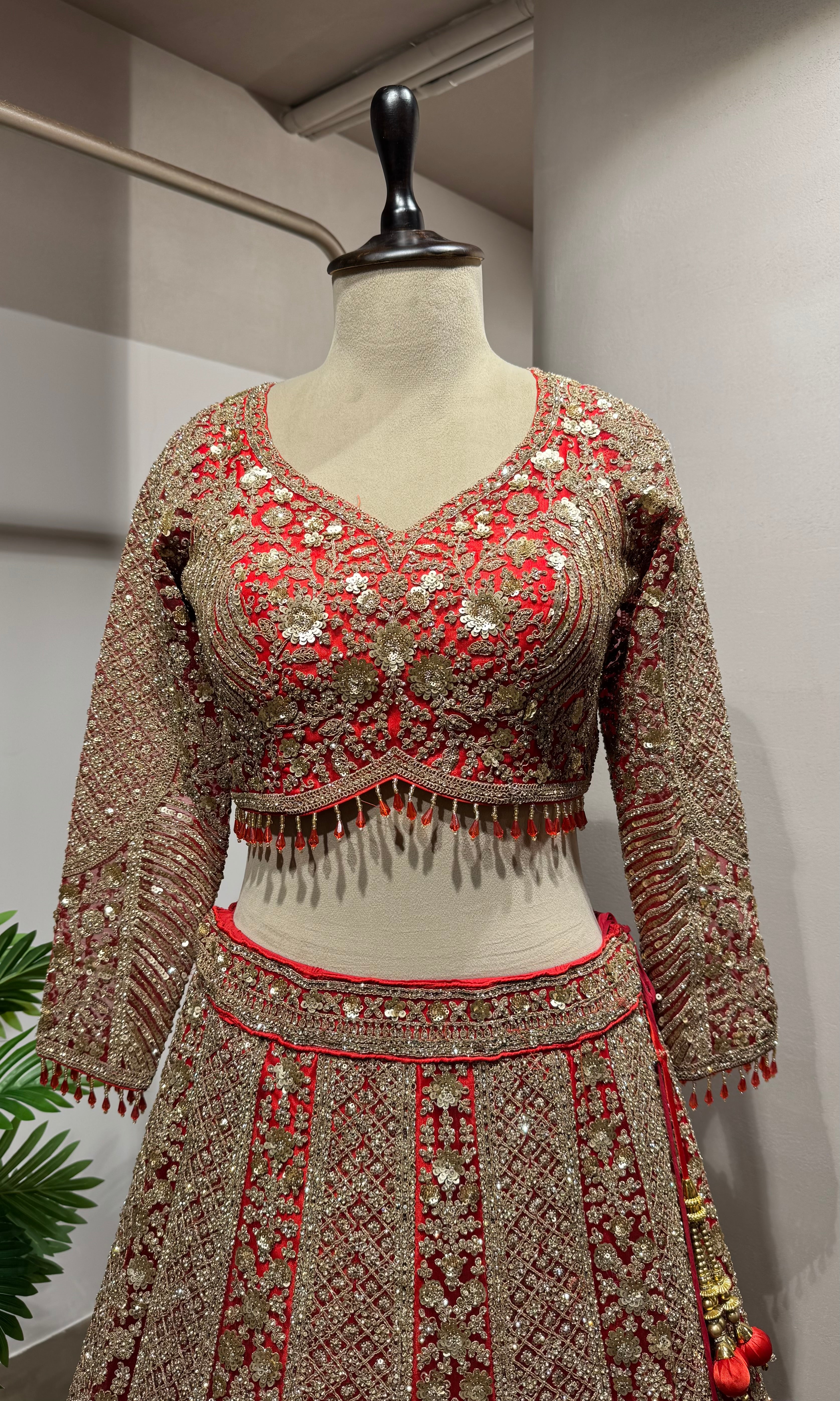 Red golden embroidery bridal lehenga