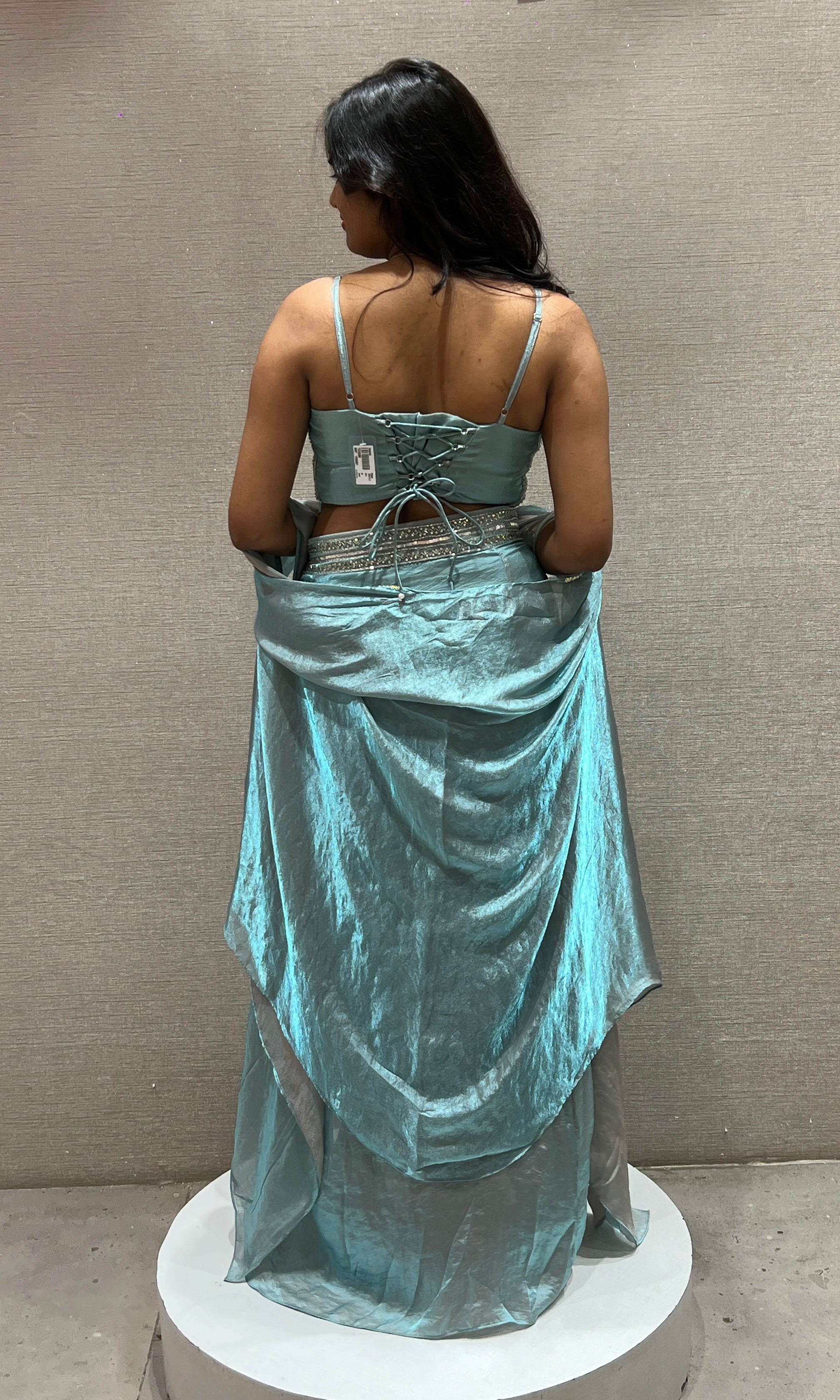 Aqua blue draped saree with Crystal Blouse