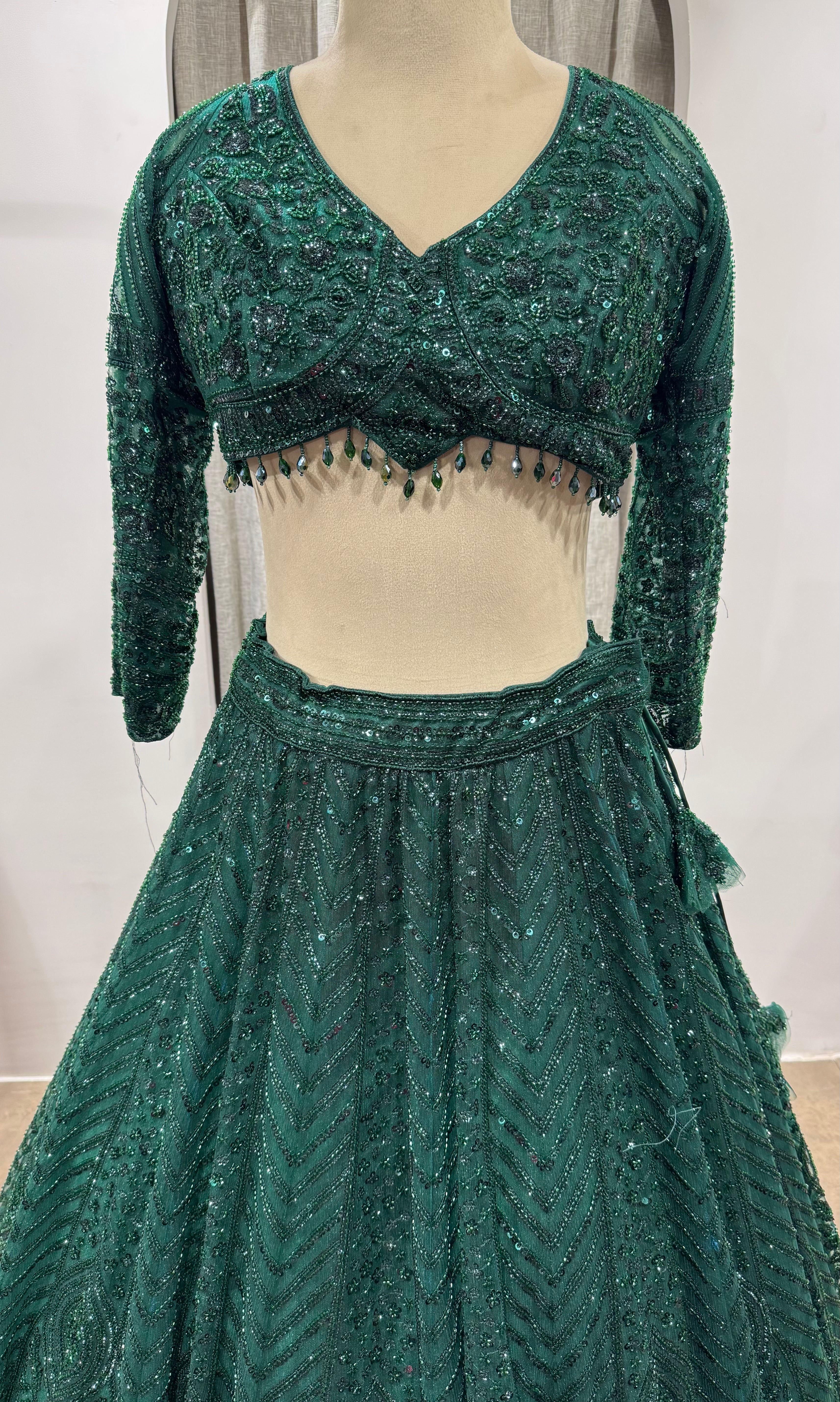emerald green net lehenga choli