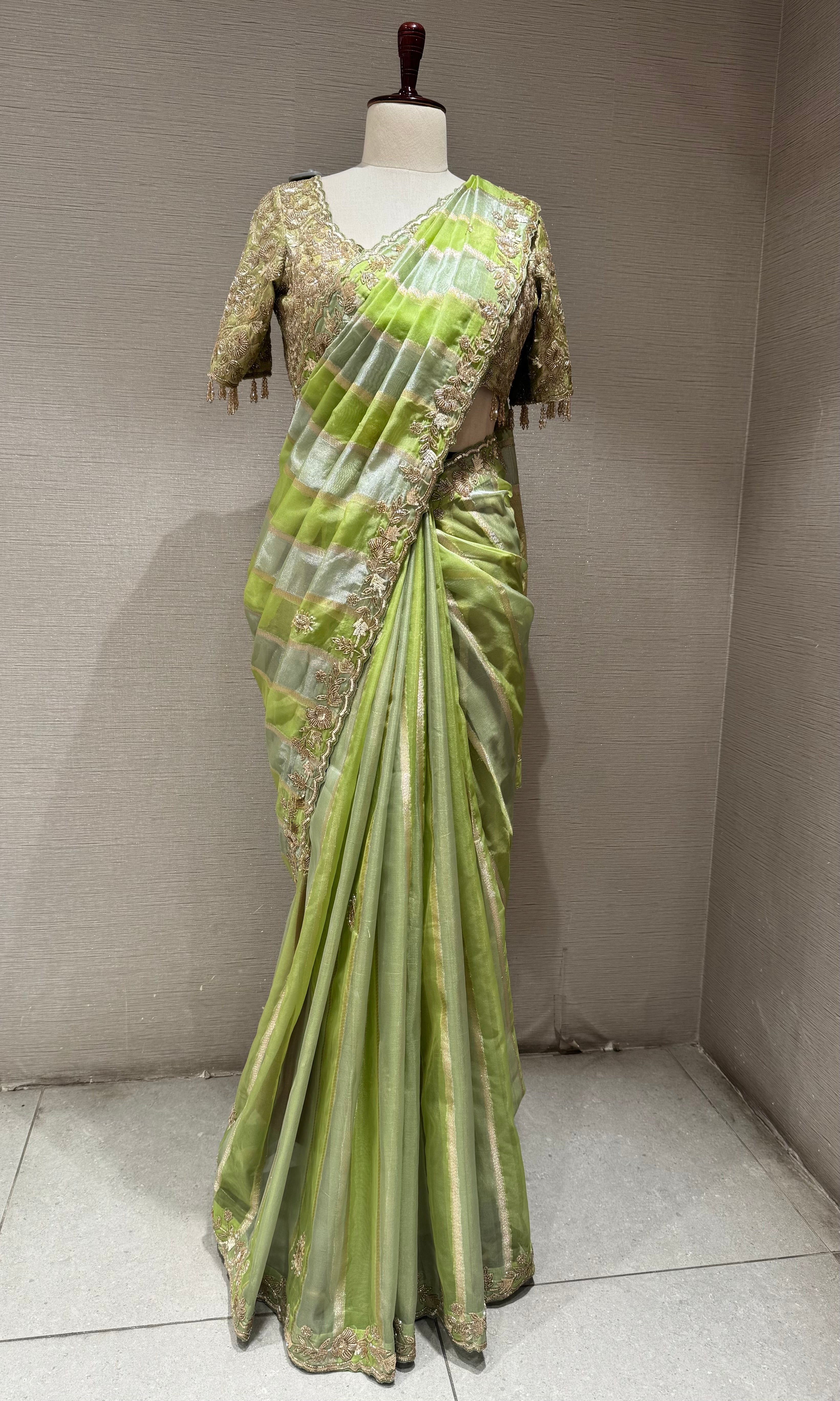 Green designer saree with embroidered blouse