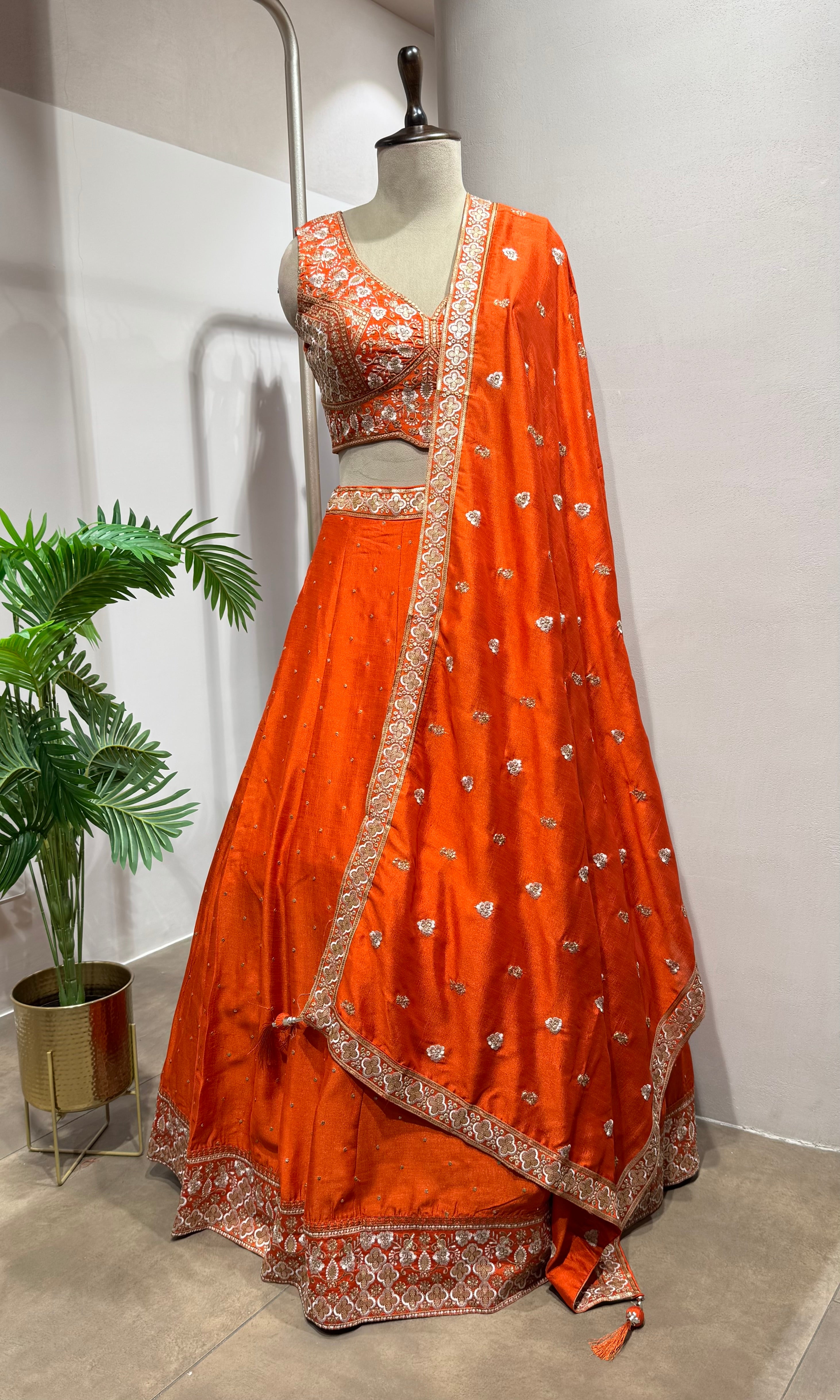 Orange golden embroidery lehenga set