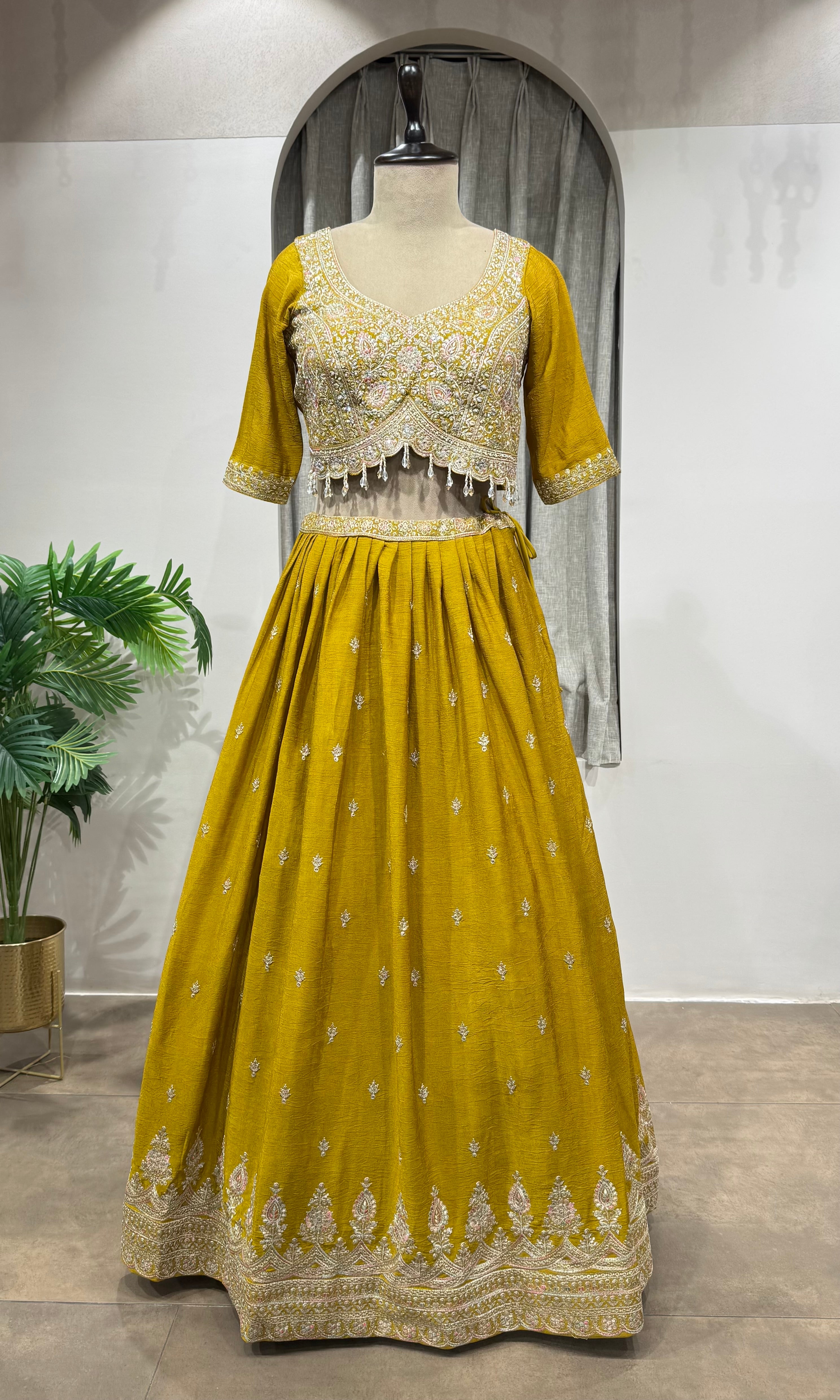 Mustard Flared Lehenga Choli with Border Embroidery