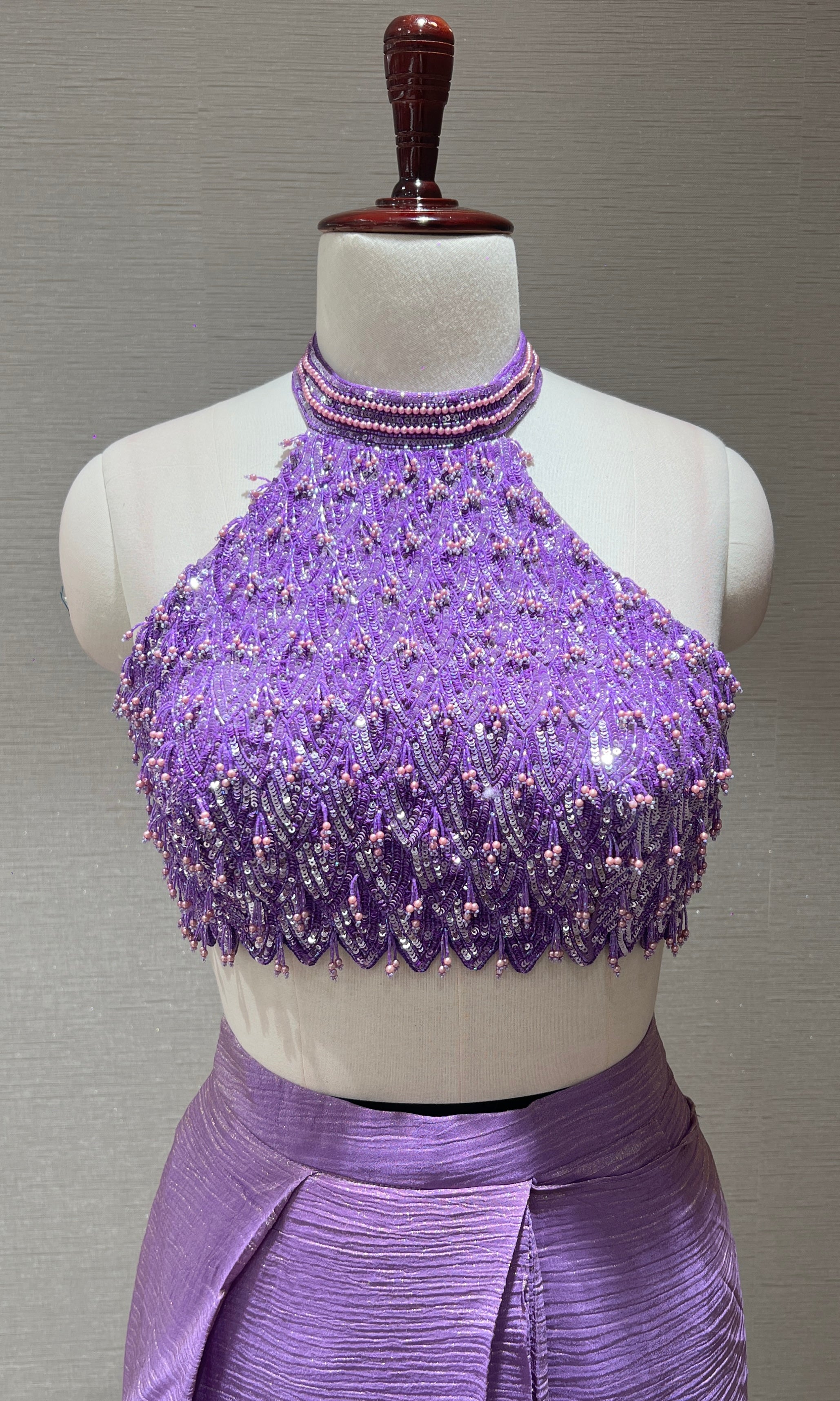 Purple drape saree with halter neck blouse