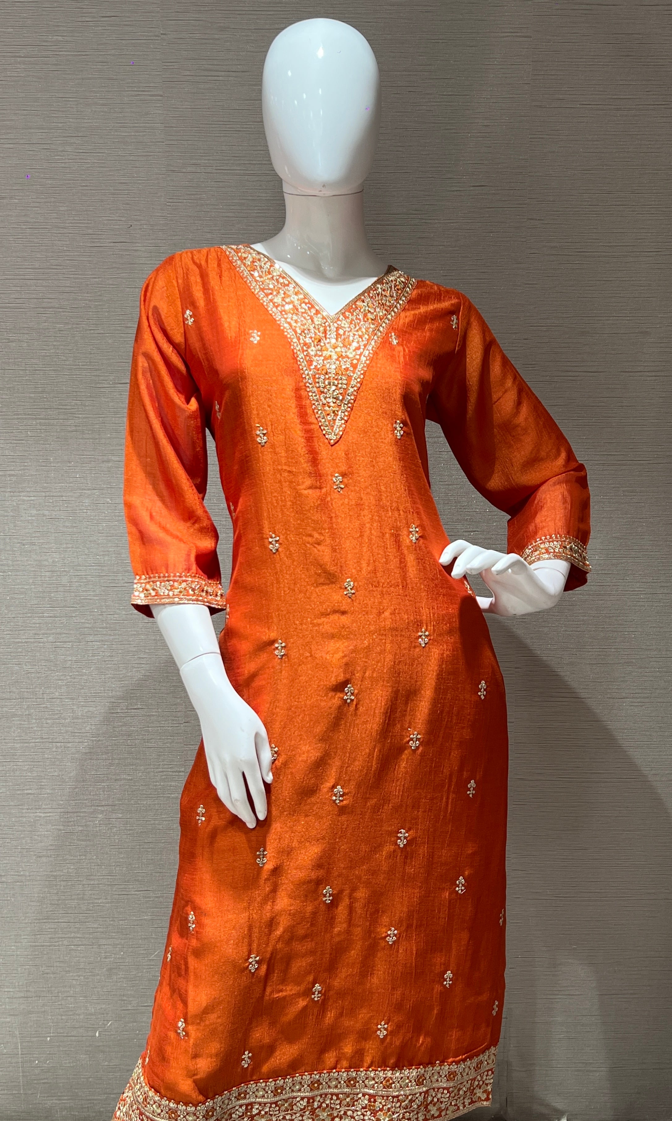 orange kurta set with contrast gold duppatta