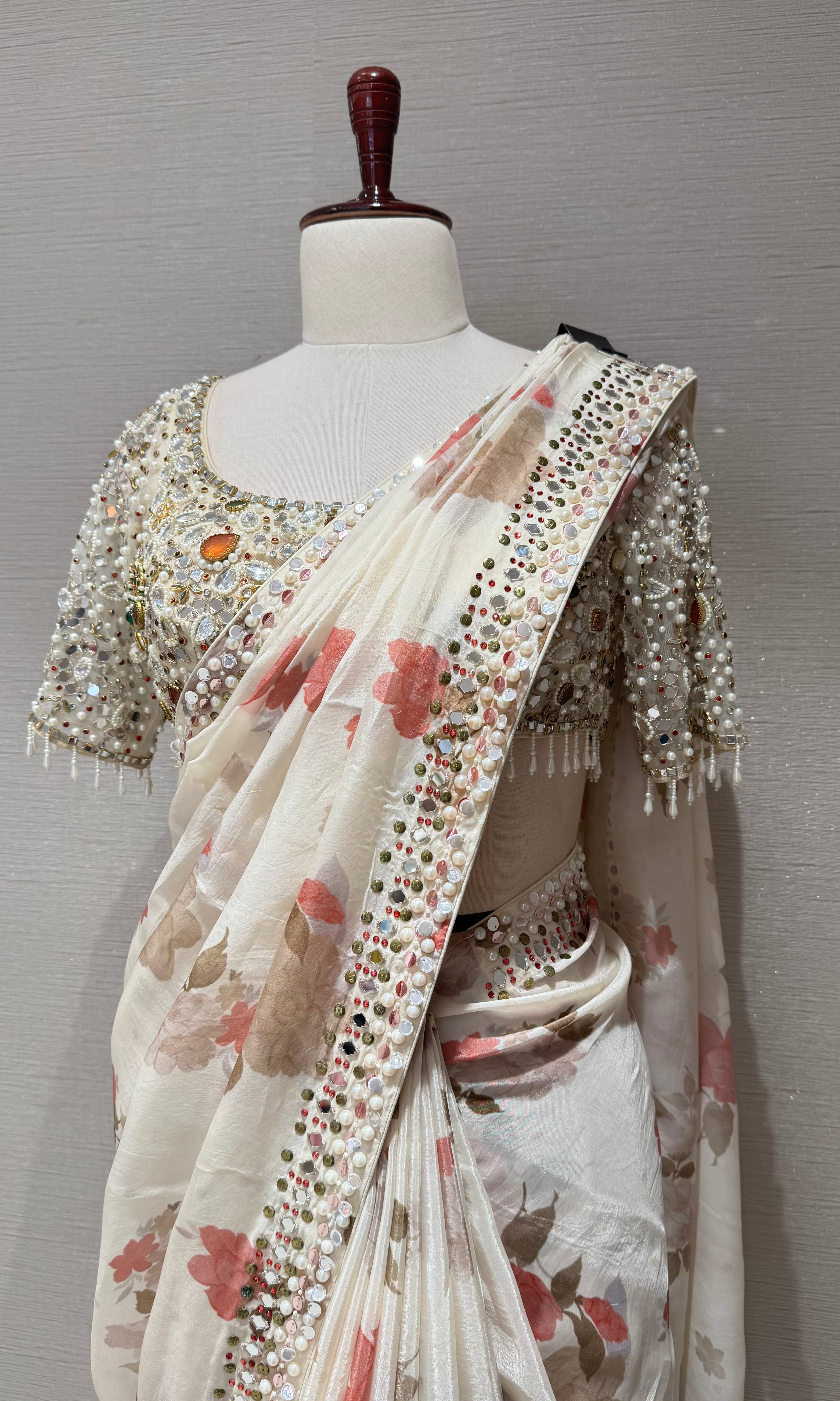 Cream elegant floral saree with embellished blouse