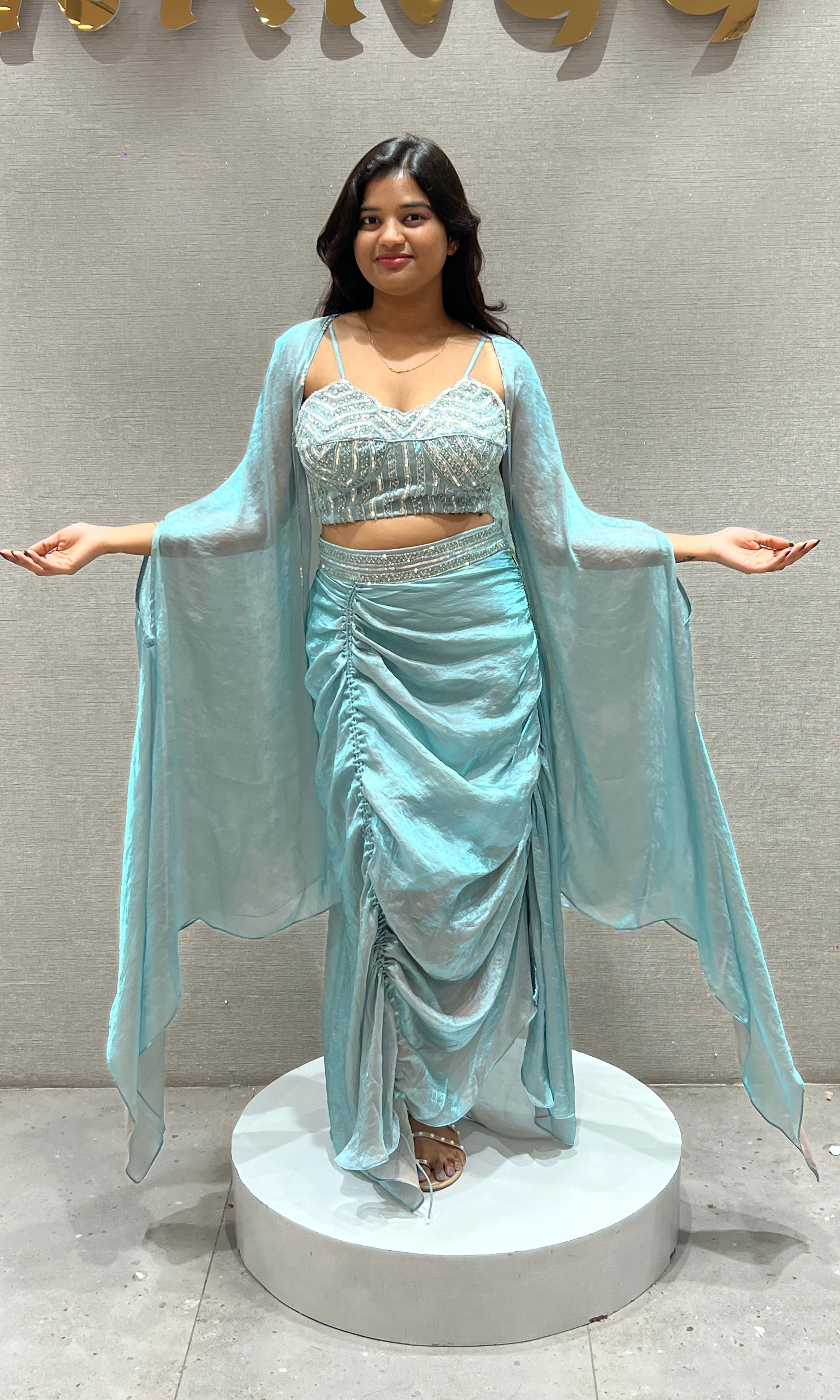 Aqua blue draped saree with Crystal Blouse