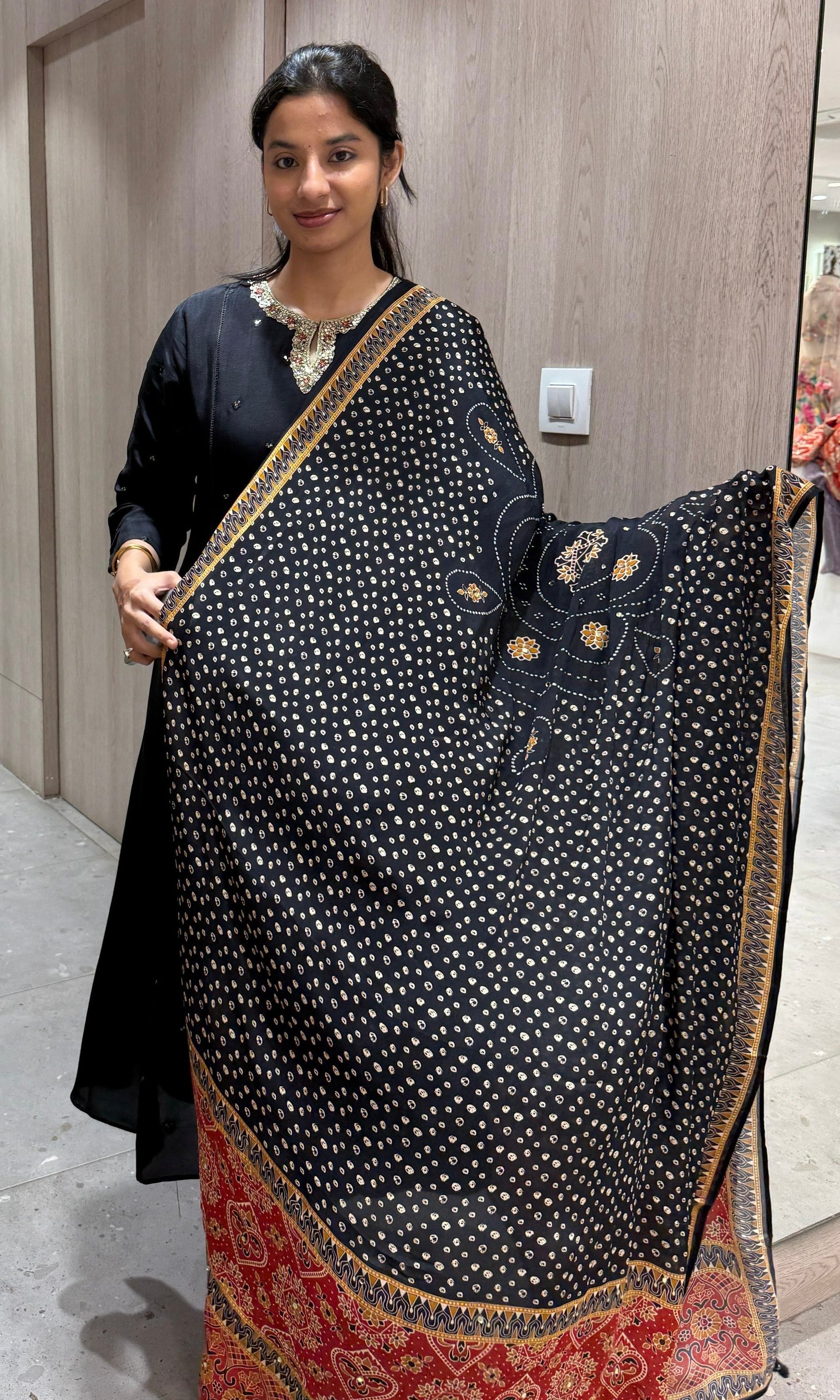 black embroidered neckline kurta set