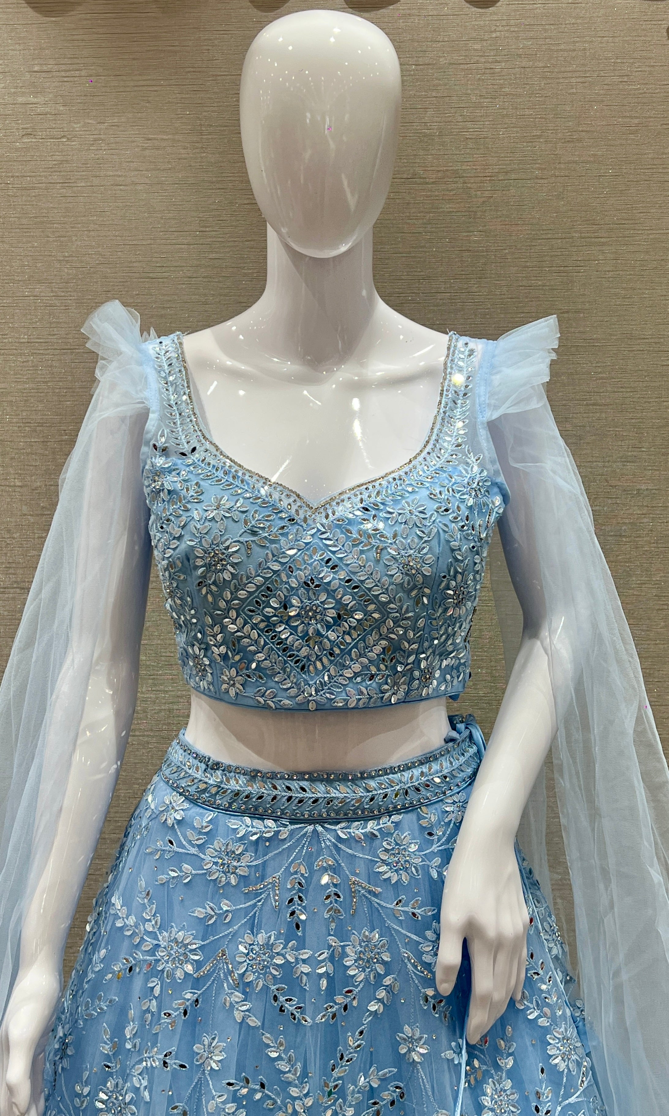 Aarvi β Sky Blue Net Embroidered Lehenga Set