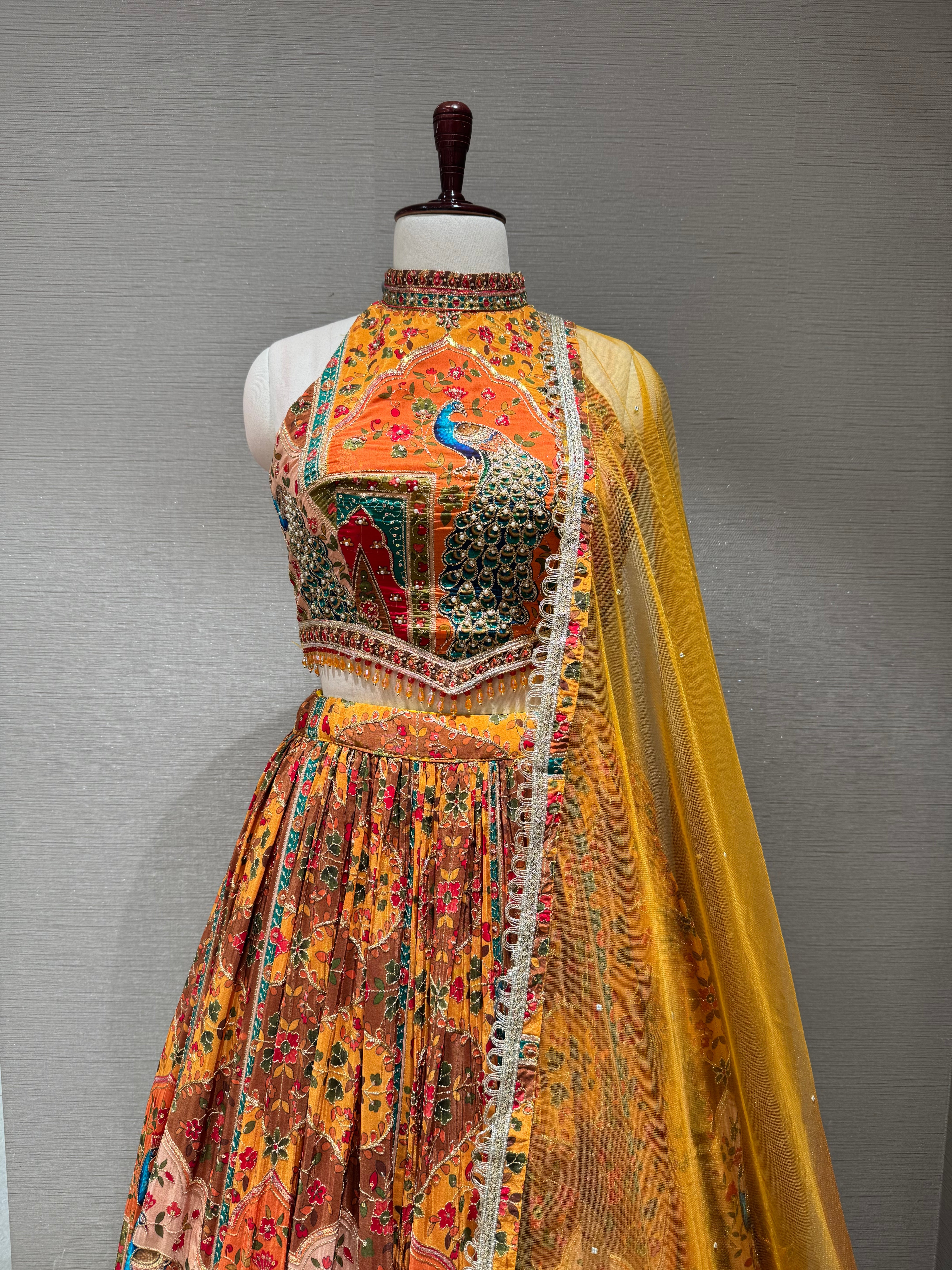 Mustard Mayur Pichwai halter neck Lehenga set