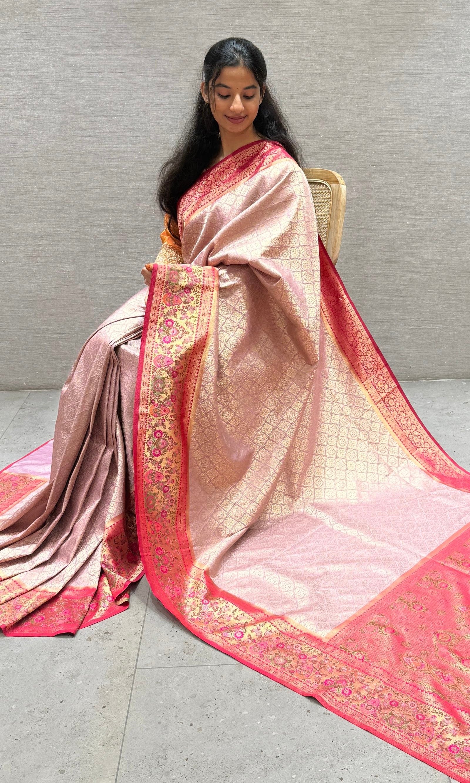Pink saree with embroidered ready blouse