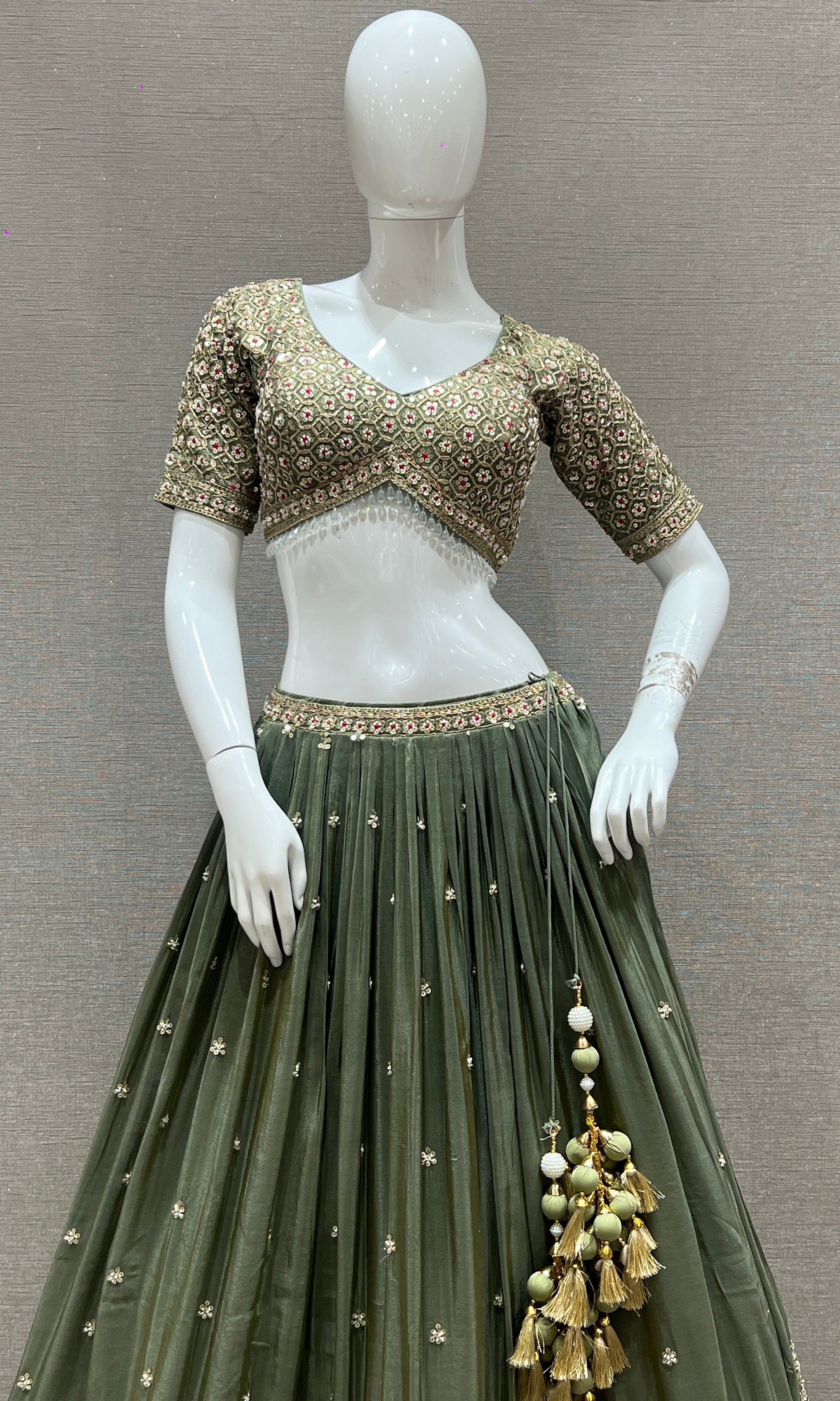 Vanika Sitara - Sage Green Lehenga with Floral & Gold Thread Work Embellishments