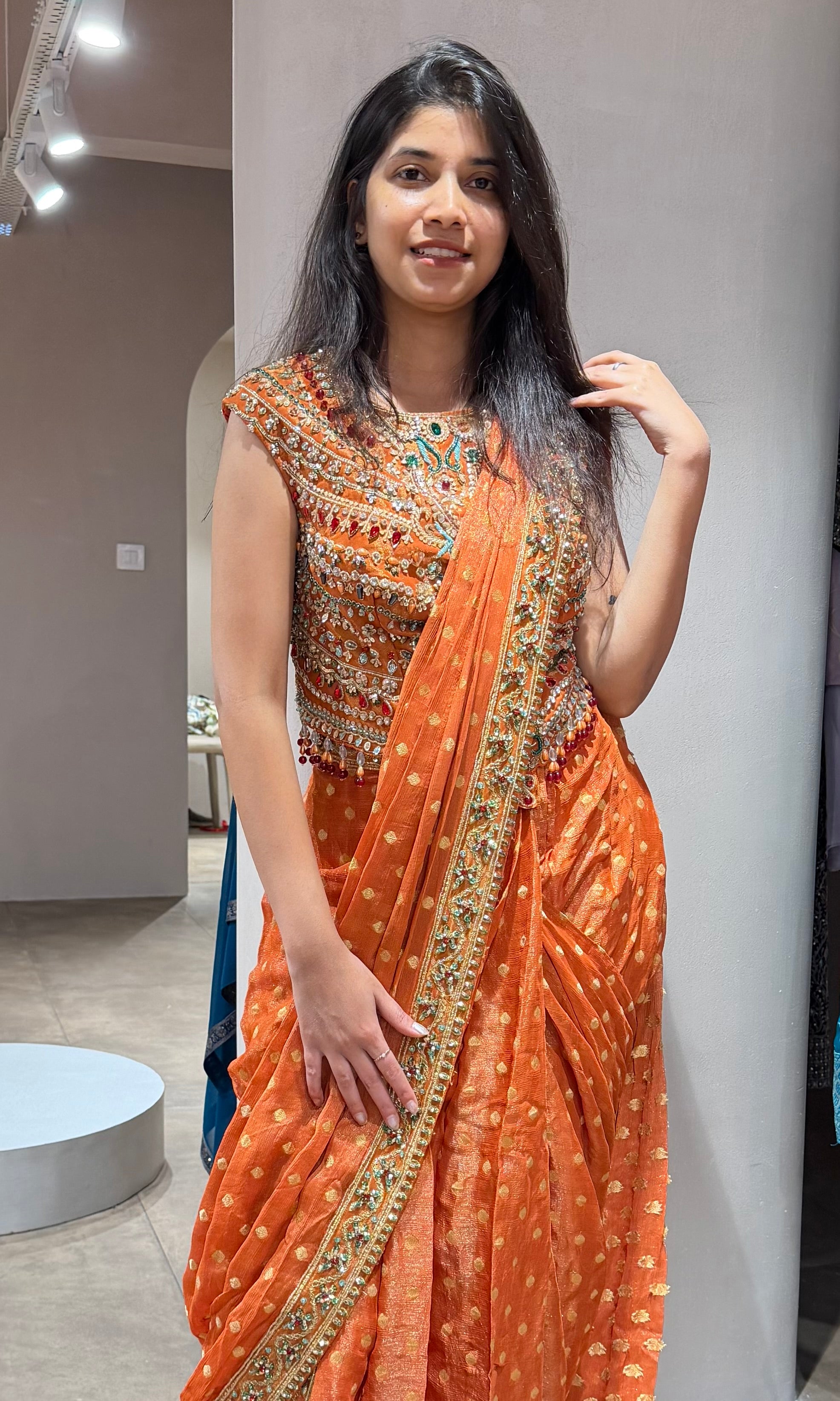 Orange INTRICATE EMBROIDERED drape saree
