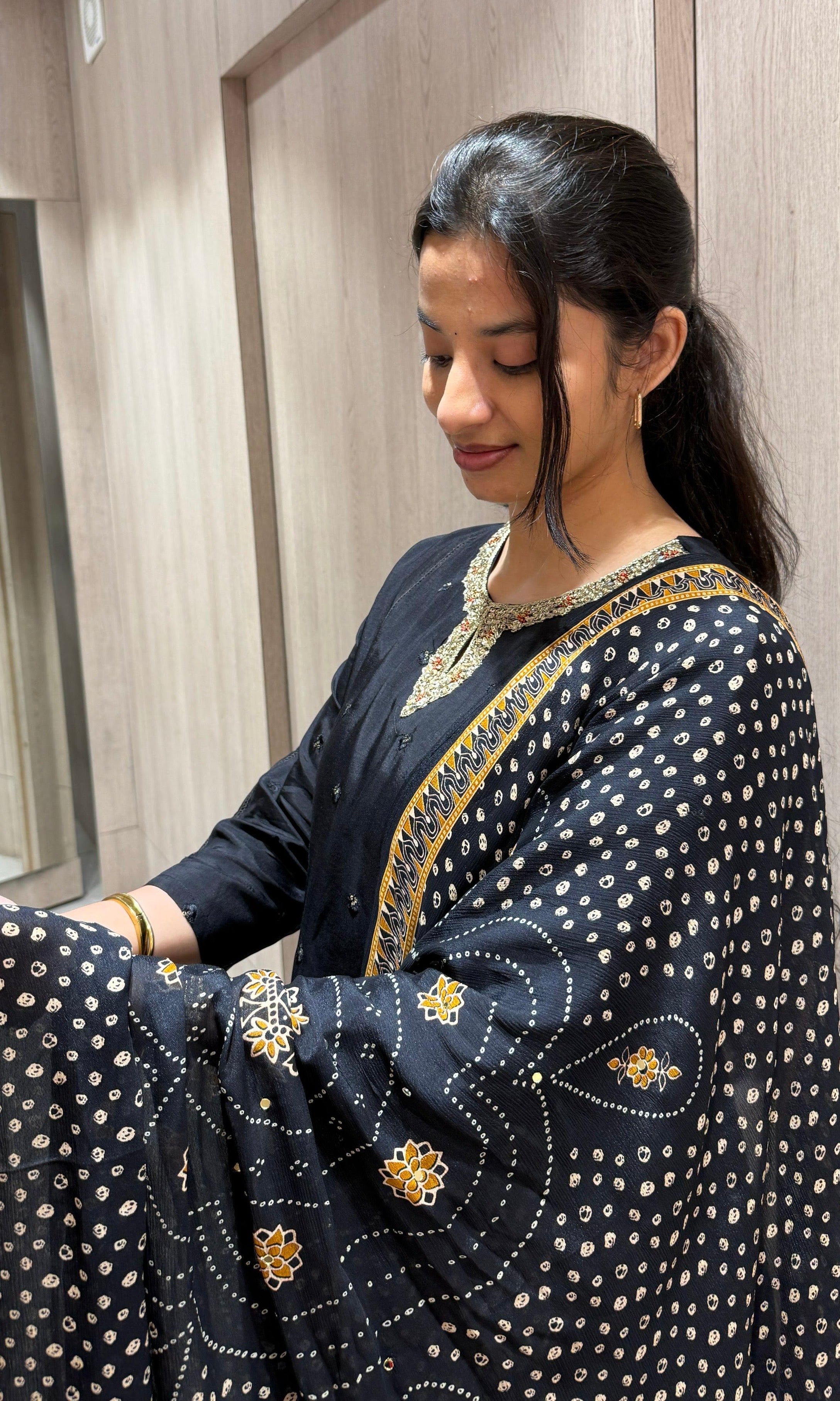 black embroidered neckline kurta set