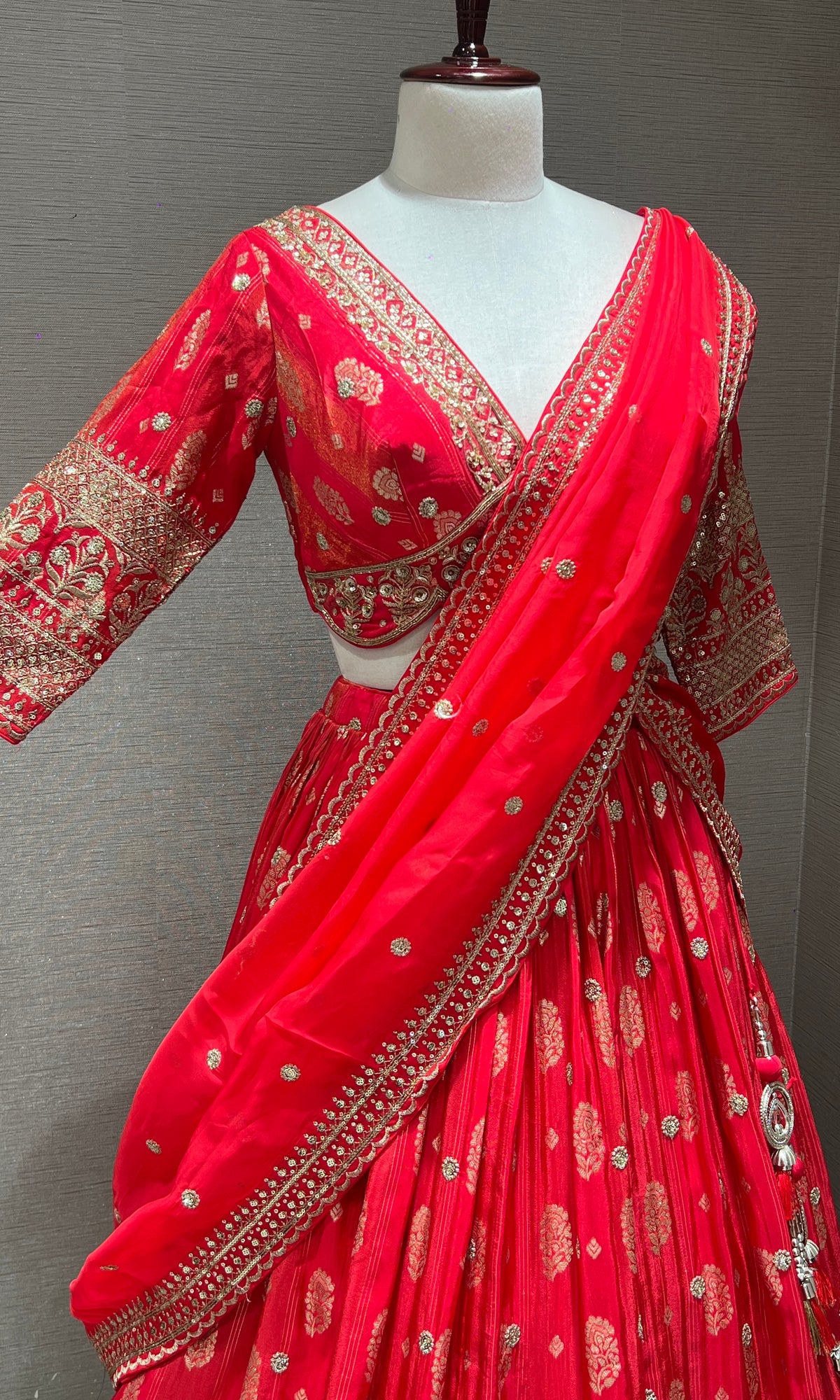 pink lehenga with intricate gold detailing