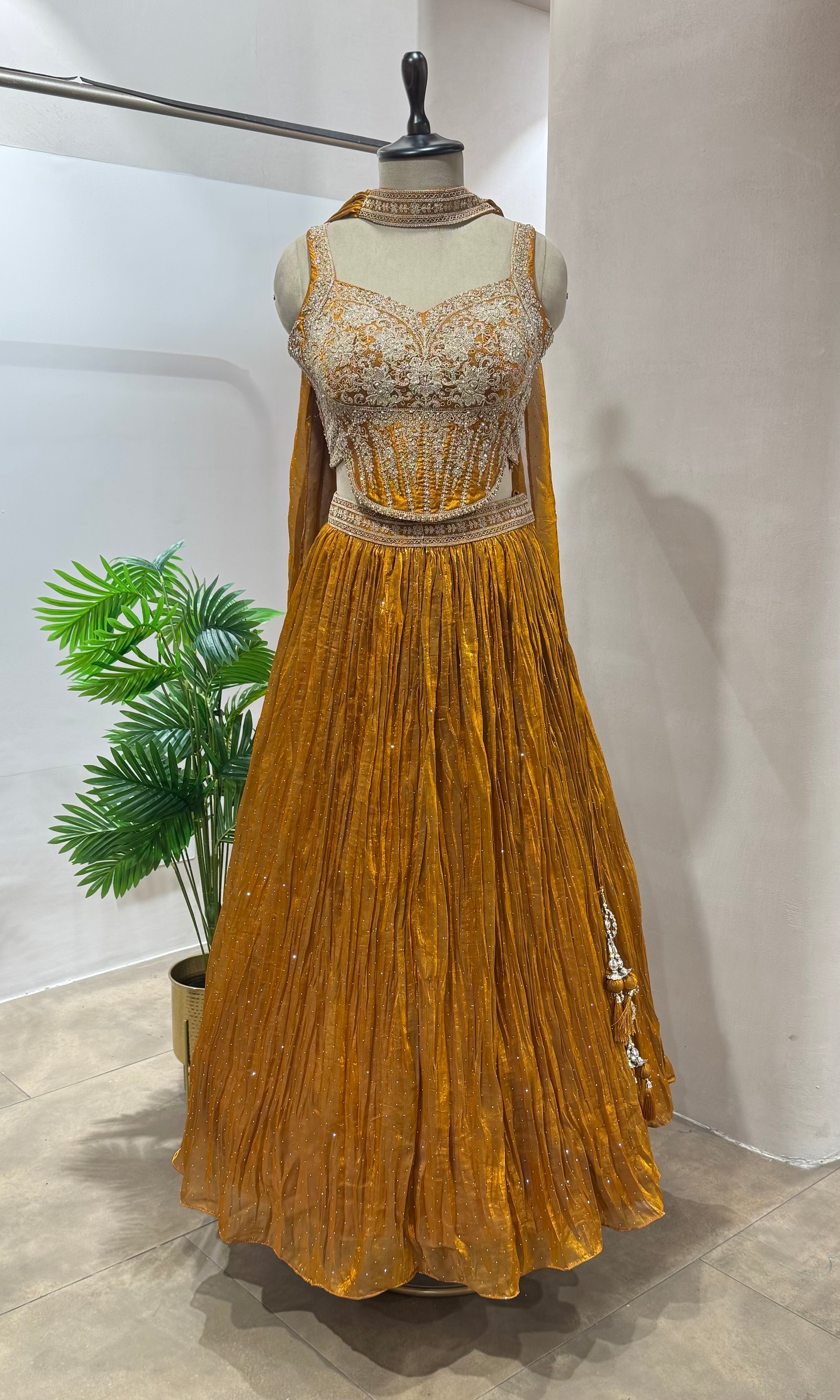 Rust EMBELLISHED LEHENGA WITH CORSET BLOUSE