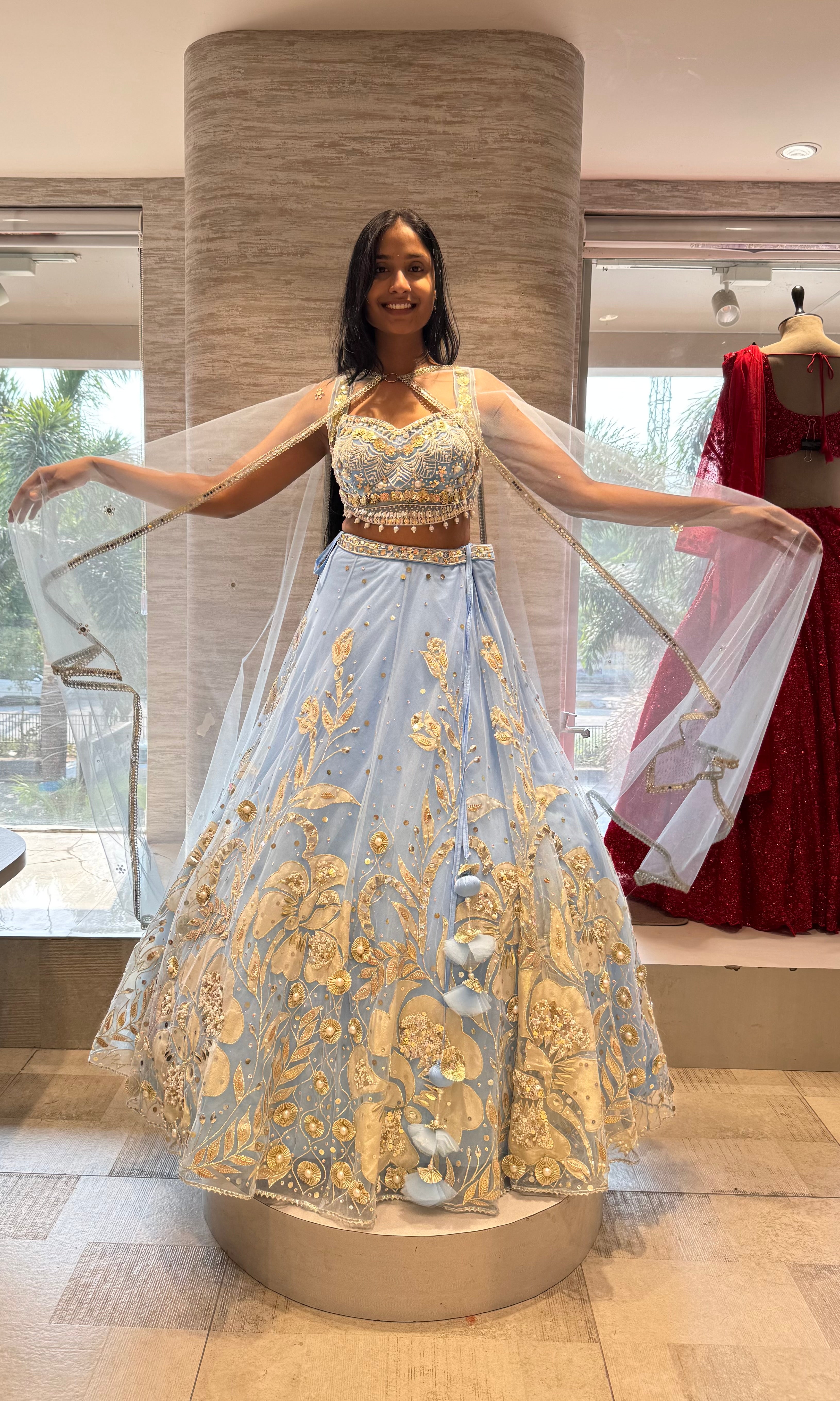 Light blue heavy gold embroidery lehenga