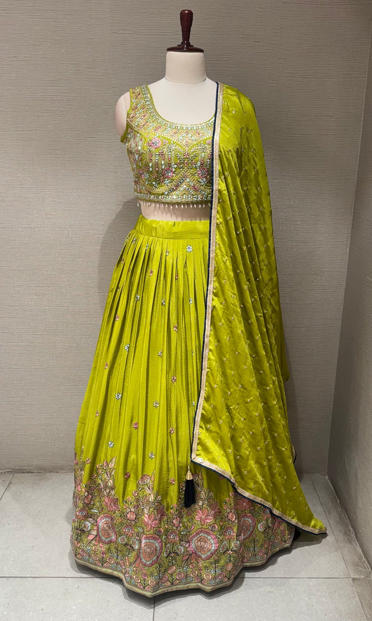 Green Tissue silk lehenga set with intricate floral embroidery