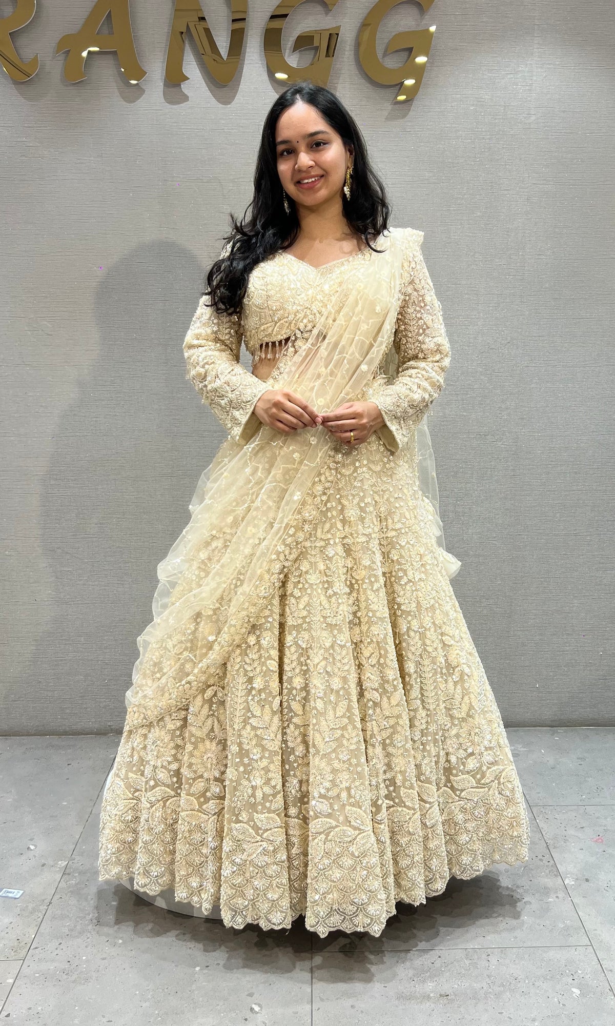 Cream soft net intricate floral Embroidery bridal lehenga
