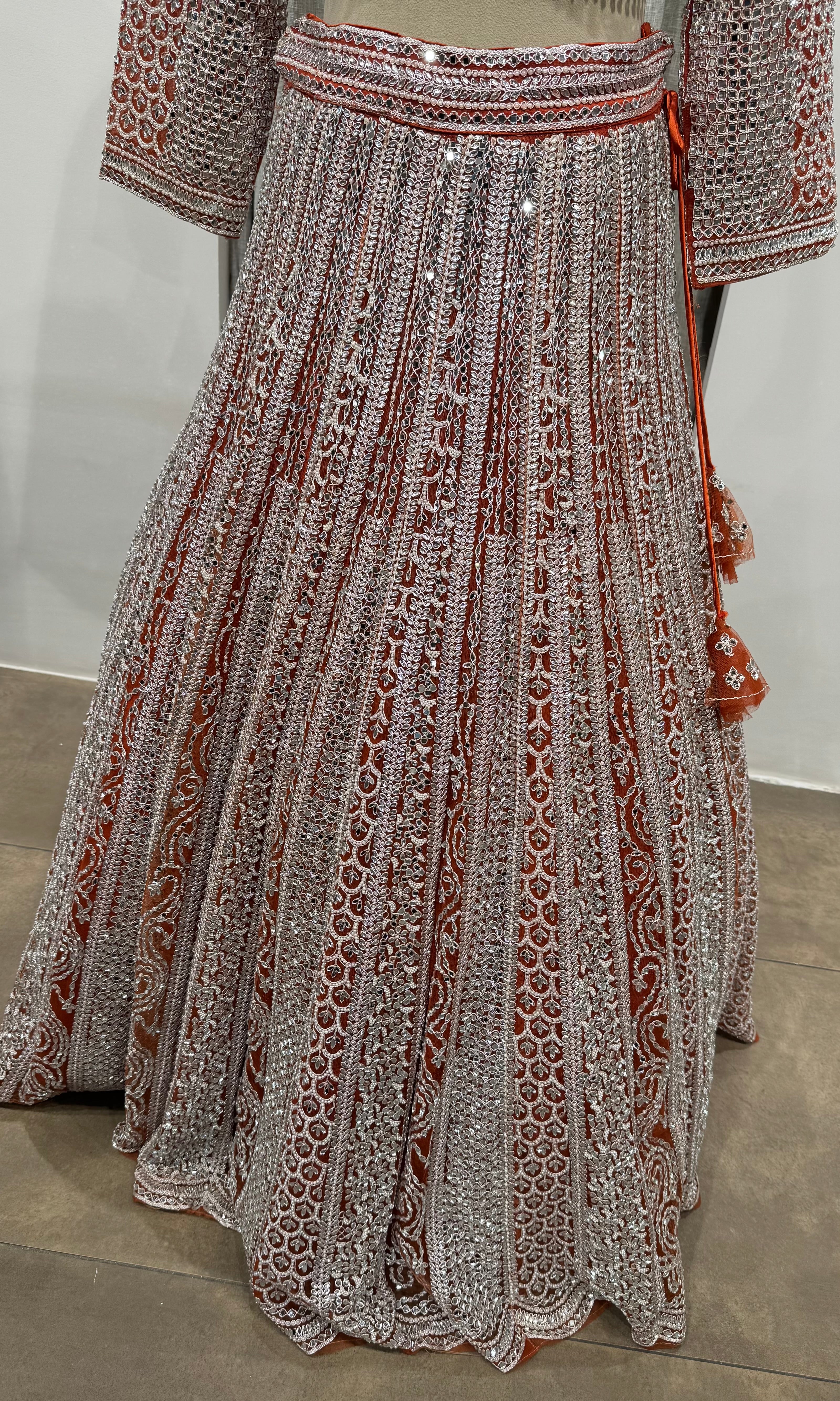 Rust and grey heavy bridal lehenga
