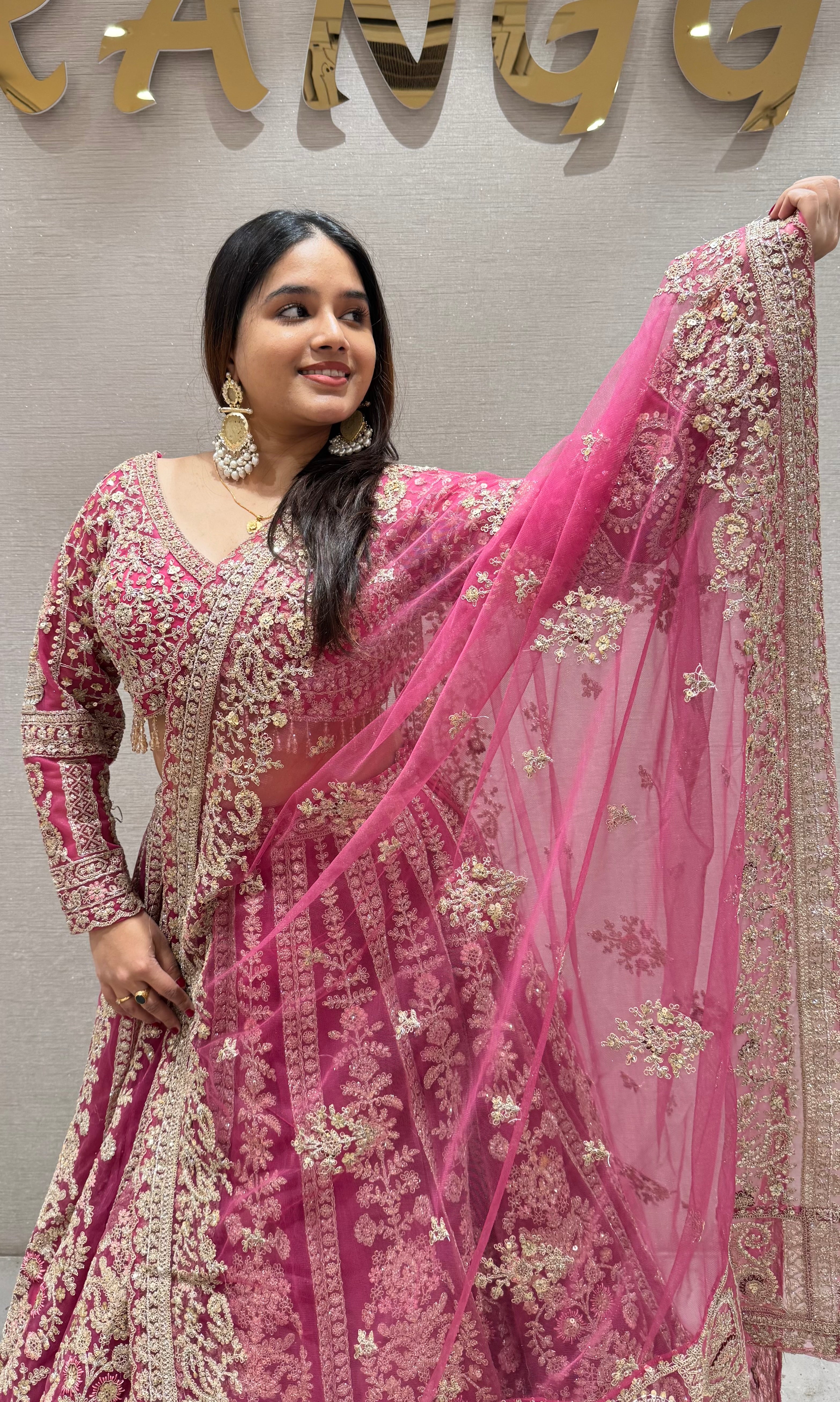 Pink lehenga with golden embroidery
