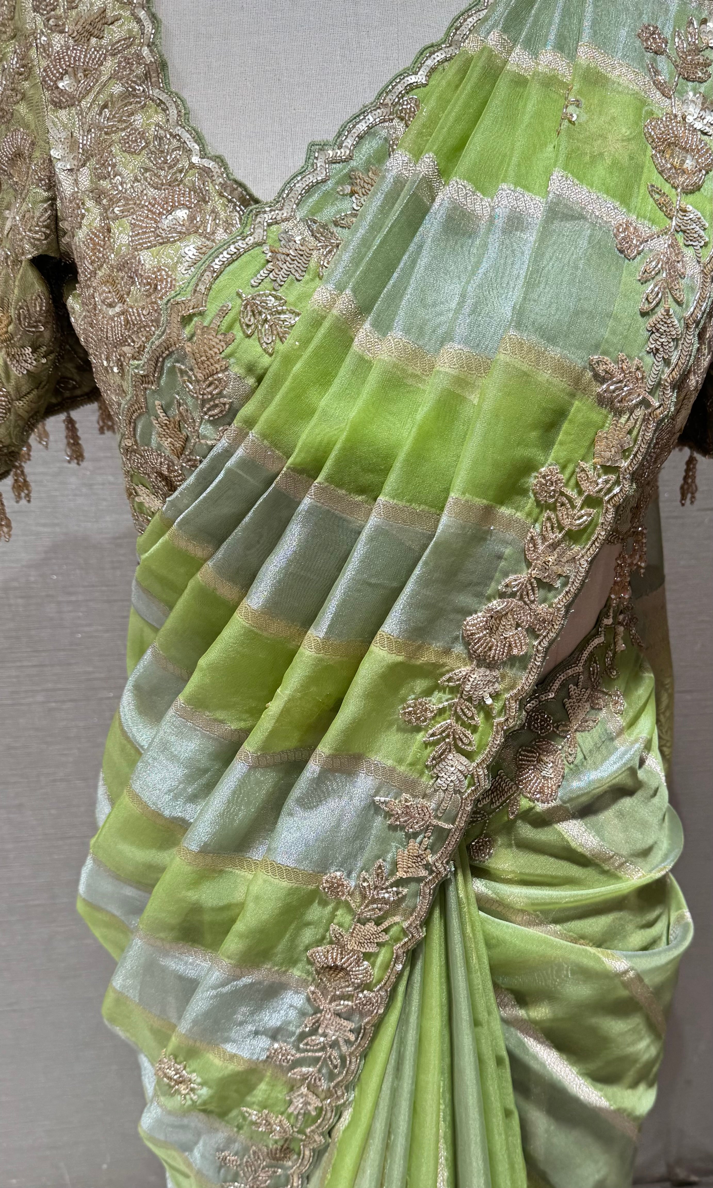 Green designer saree with embroidered blouse