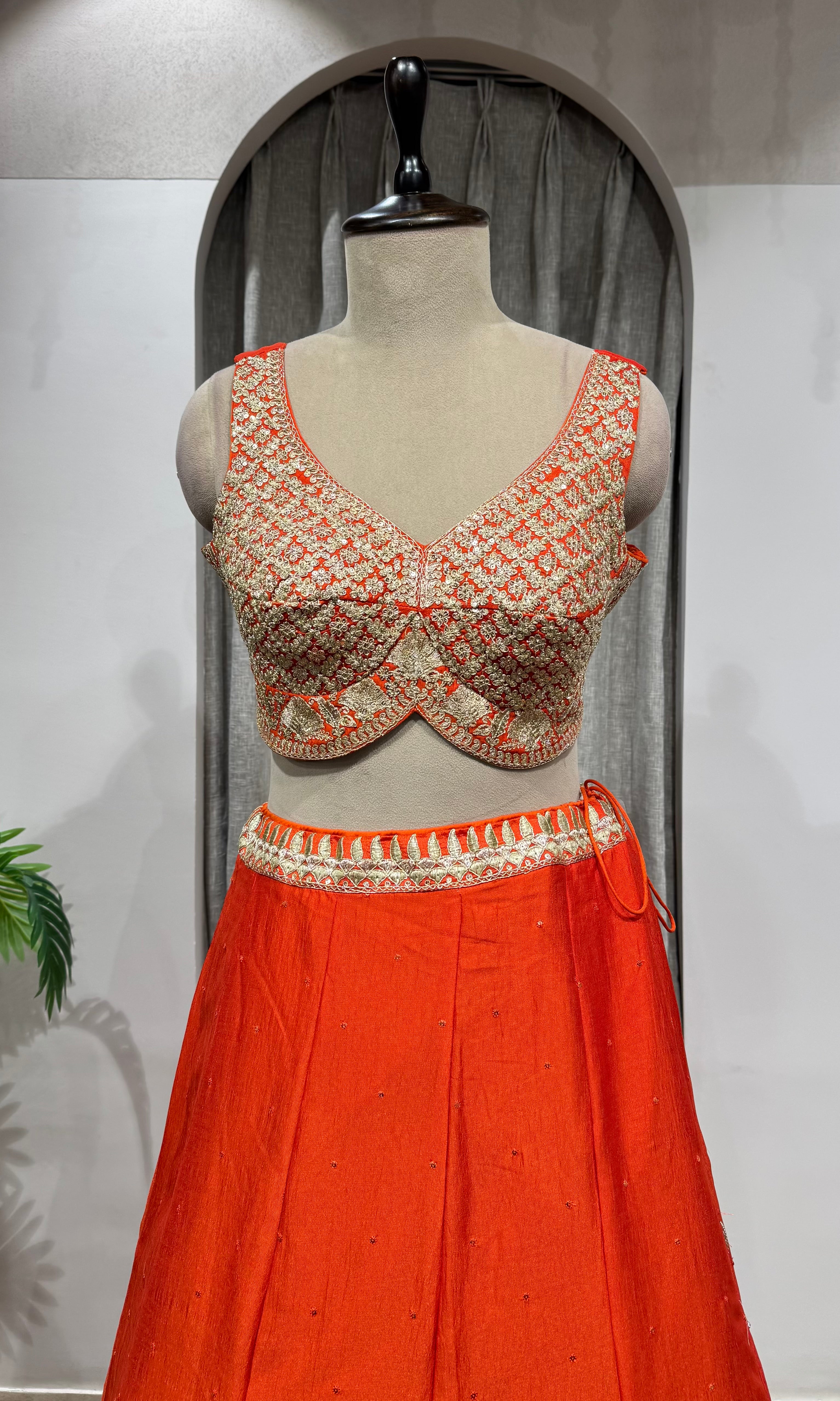 ORANGE LEHENGA WITH GOLDEN EMBROIDERY