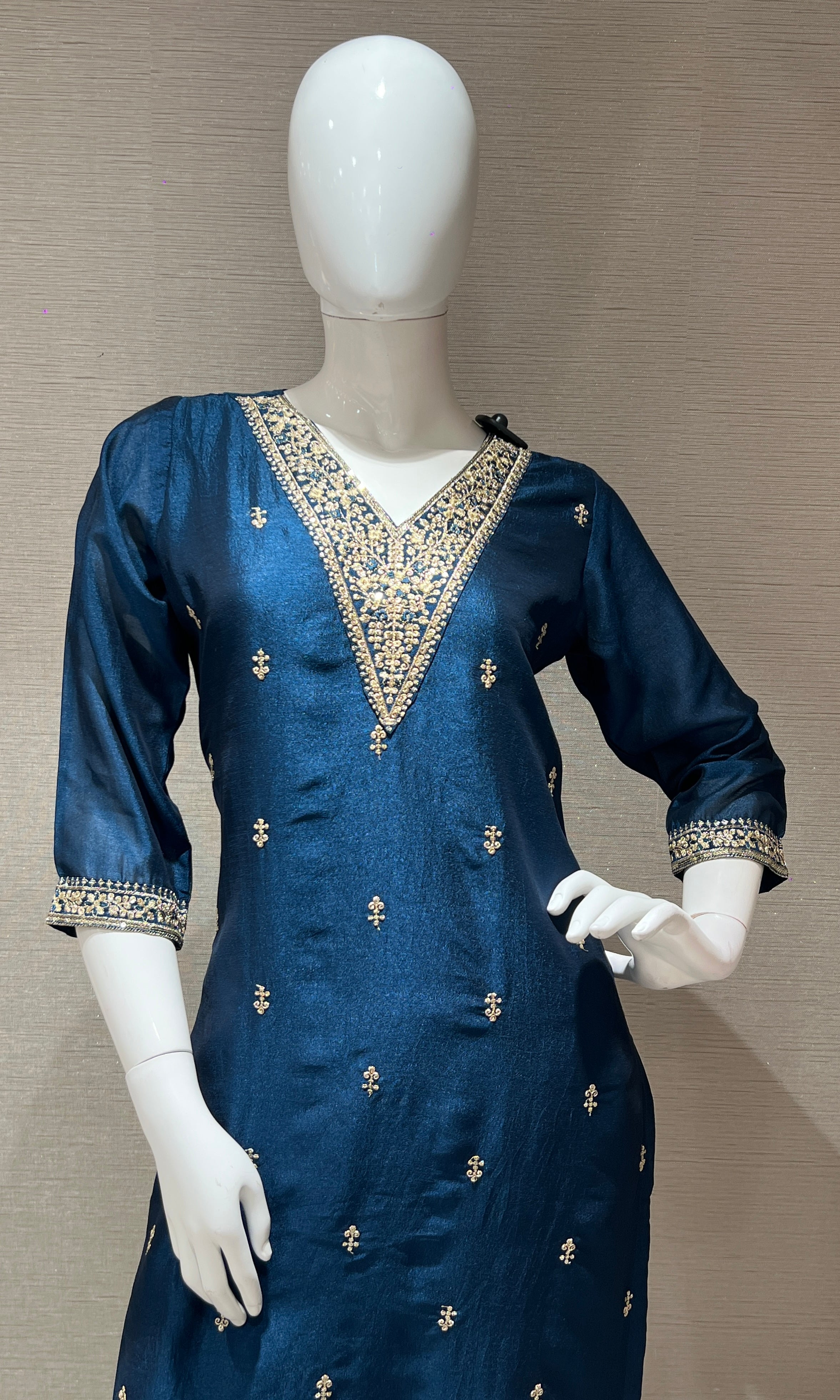 peacock blue kurta set with gold duppatta